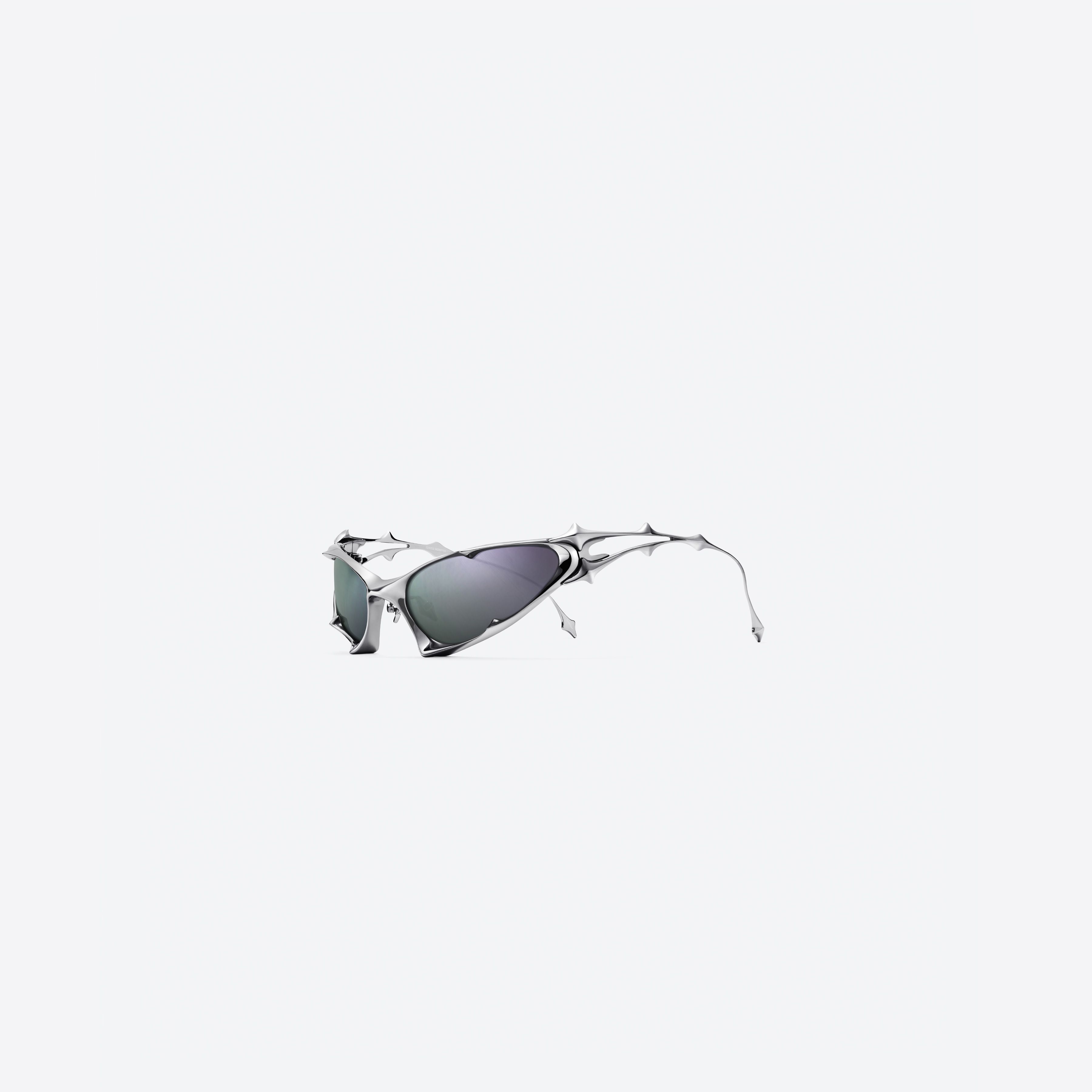 45-degree view of Gentle Monster Goxx 02 Silver Metal framed Wraparound sunglasses.