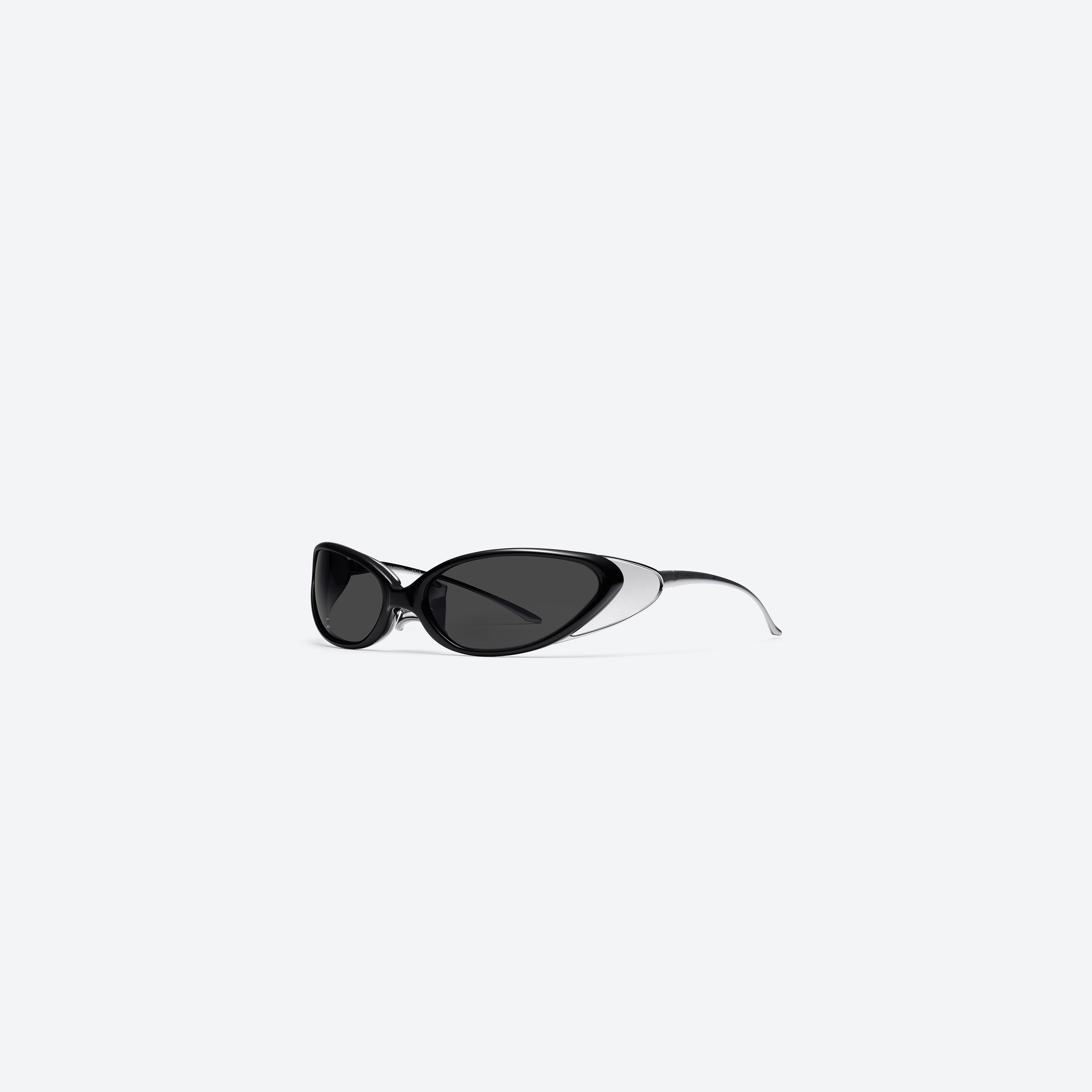 45-degree view of Gentle Monster Noiz Veil 01 Black Nylon framed Wraparound sunglasses.