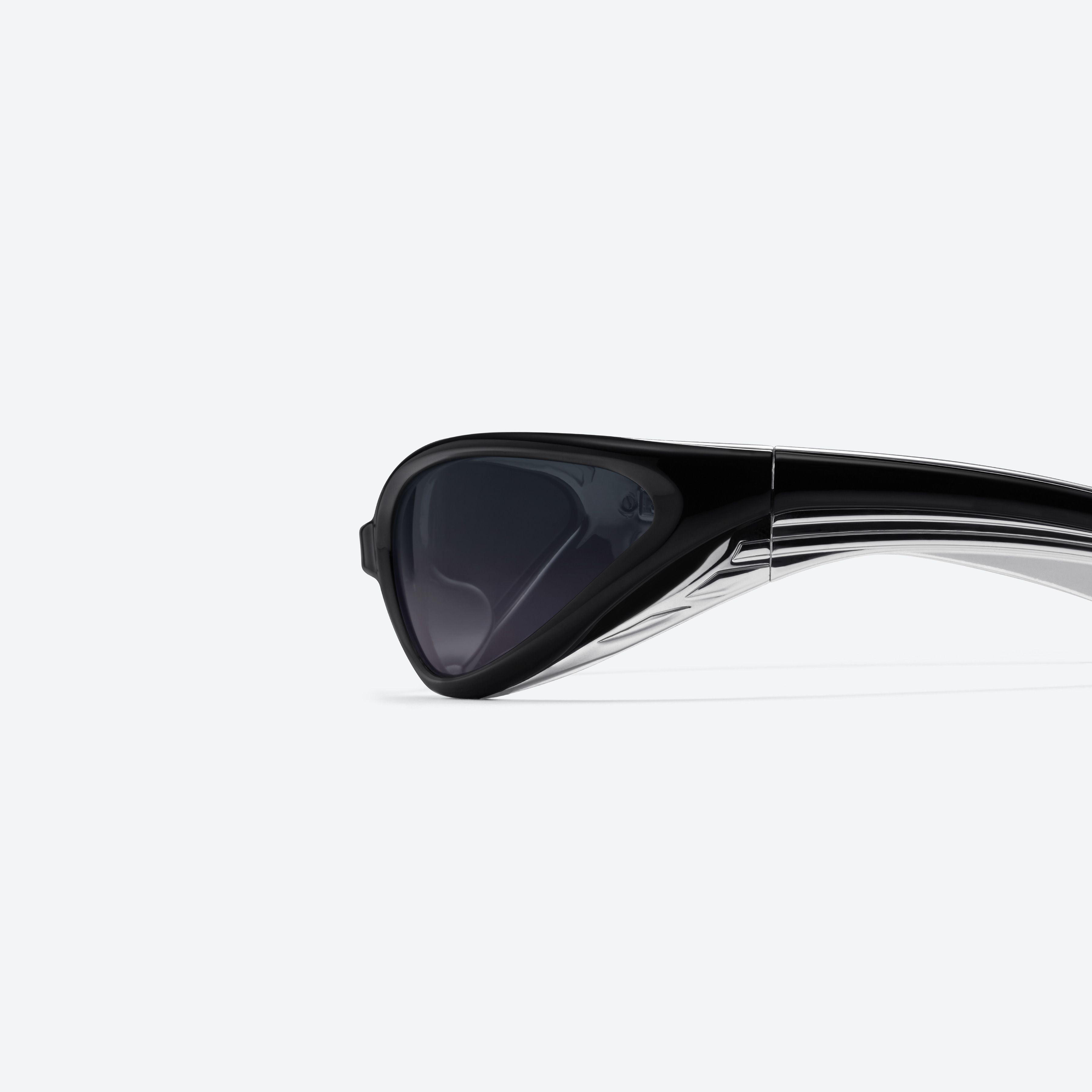 A detailed left view of Gentle Monster Apex 01 Black Nylon framed Wraparound sunglasses.