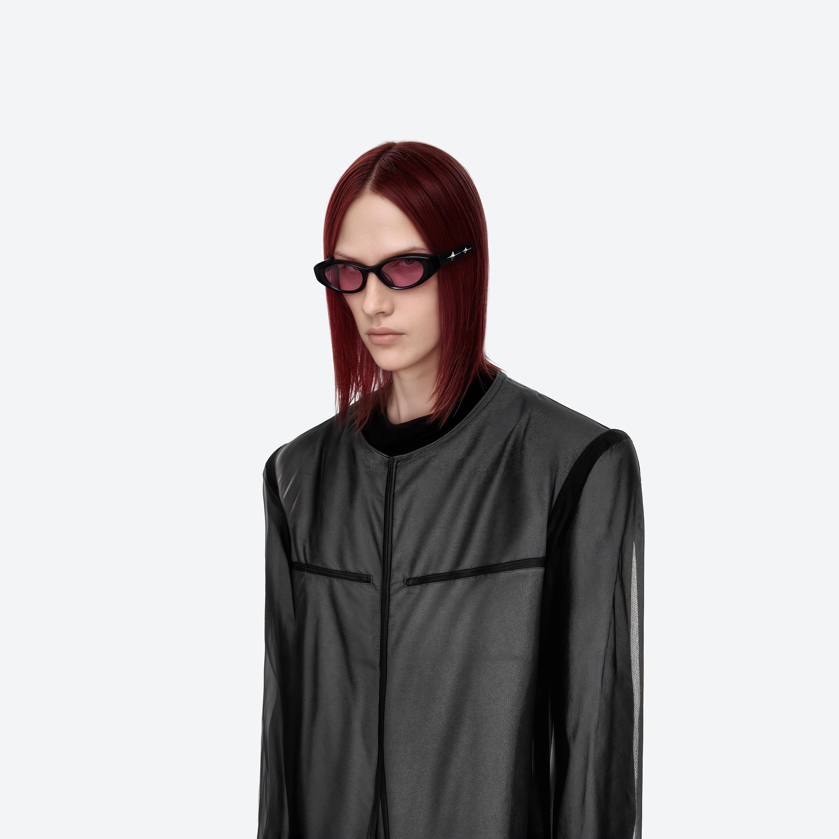 Model wearing the Synth 01 Black Acetate framed Cat-eye sunglasses.