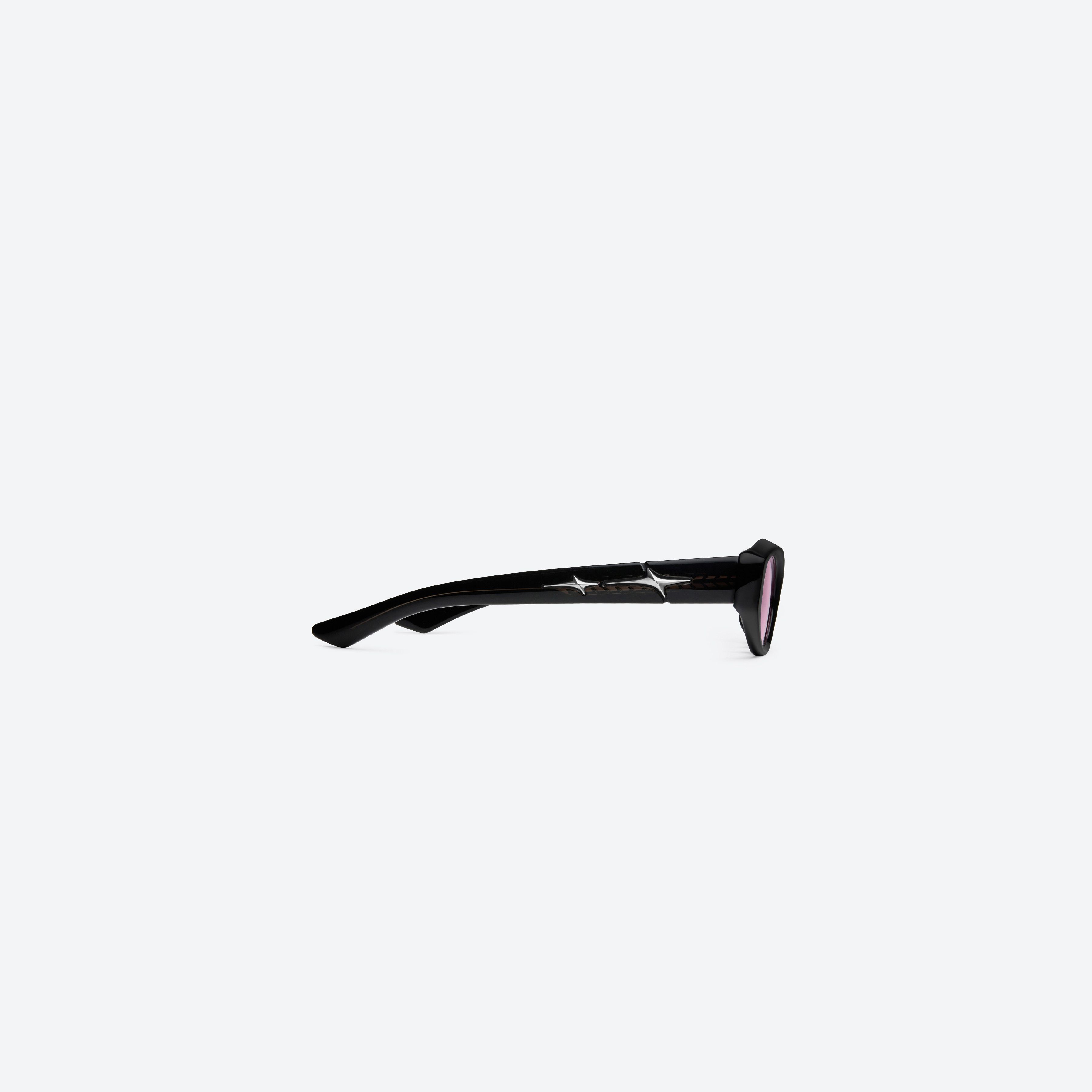 A detailed right view of Gentle Monster Synth 01 Black Acetate framed Cat-eye sunglasses.
