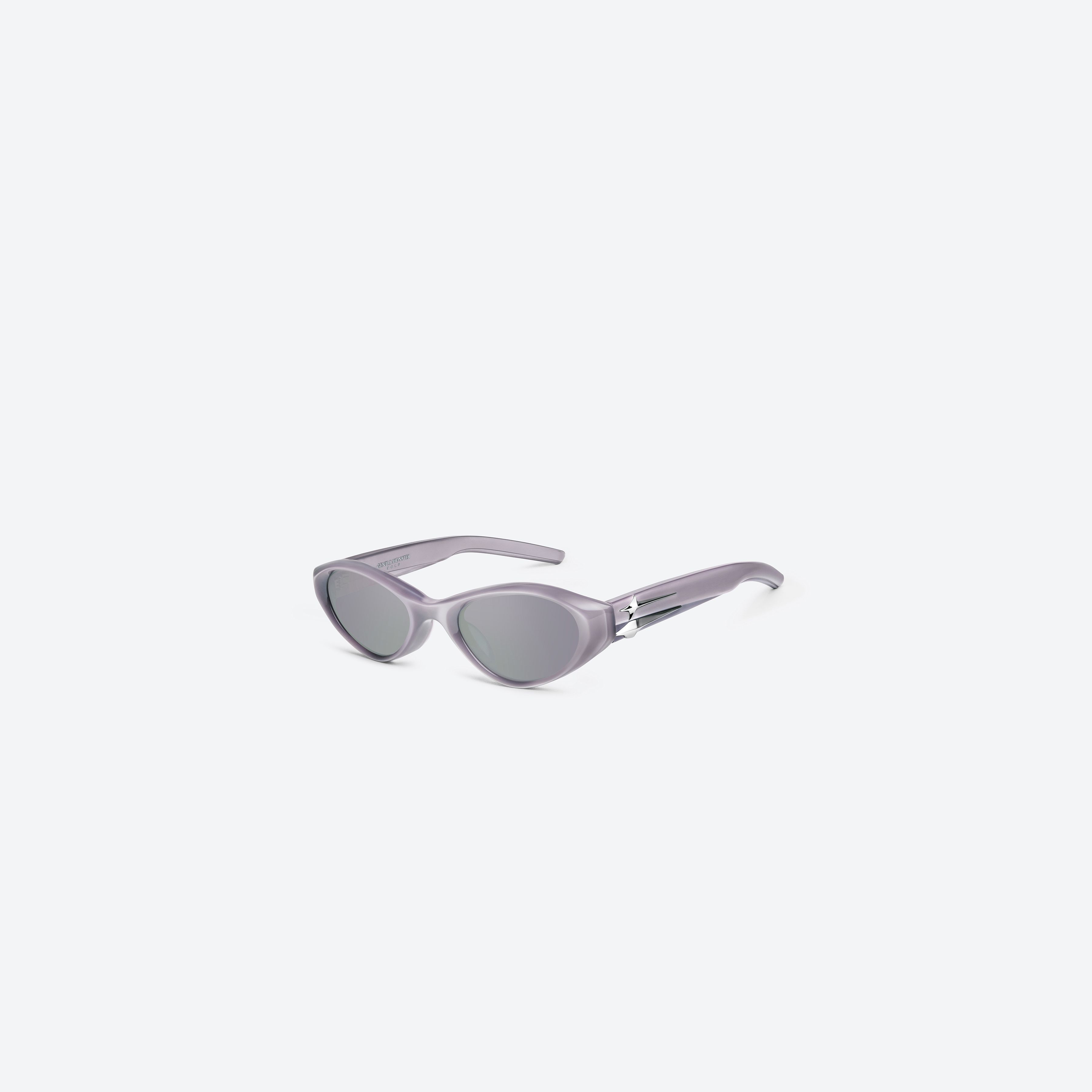 45-degree view of Gentle Monster Eq P8 Pink Acetate framed Cat-eye sunglasses.