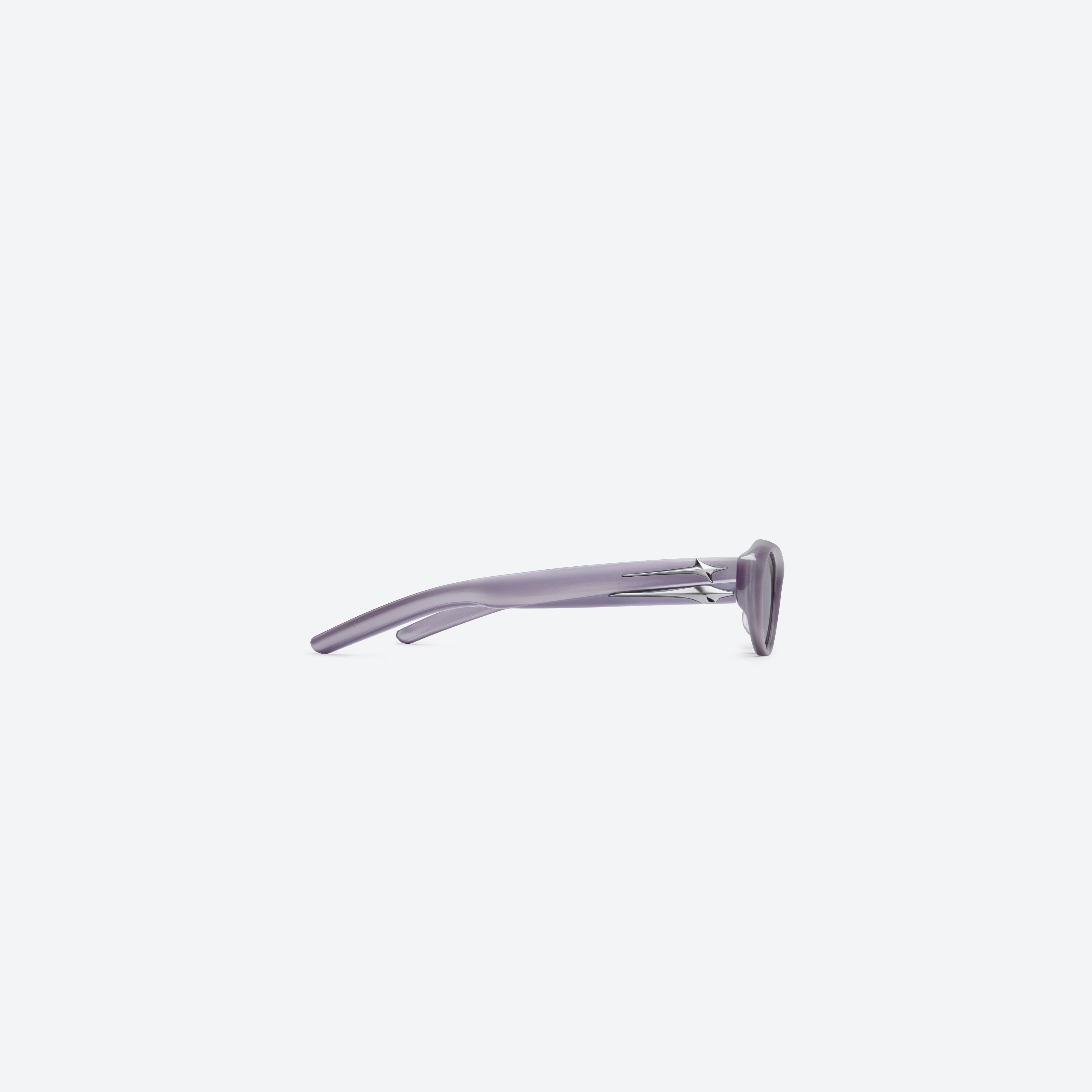 A detailed right view of Gentle Monster Eq P8 Pink Acetate framed Cat-eye sunglasses.