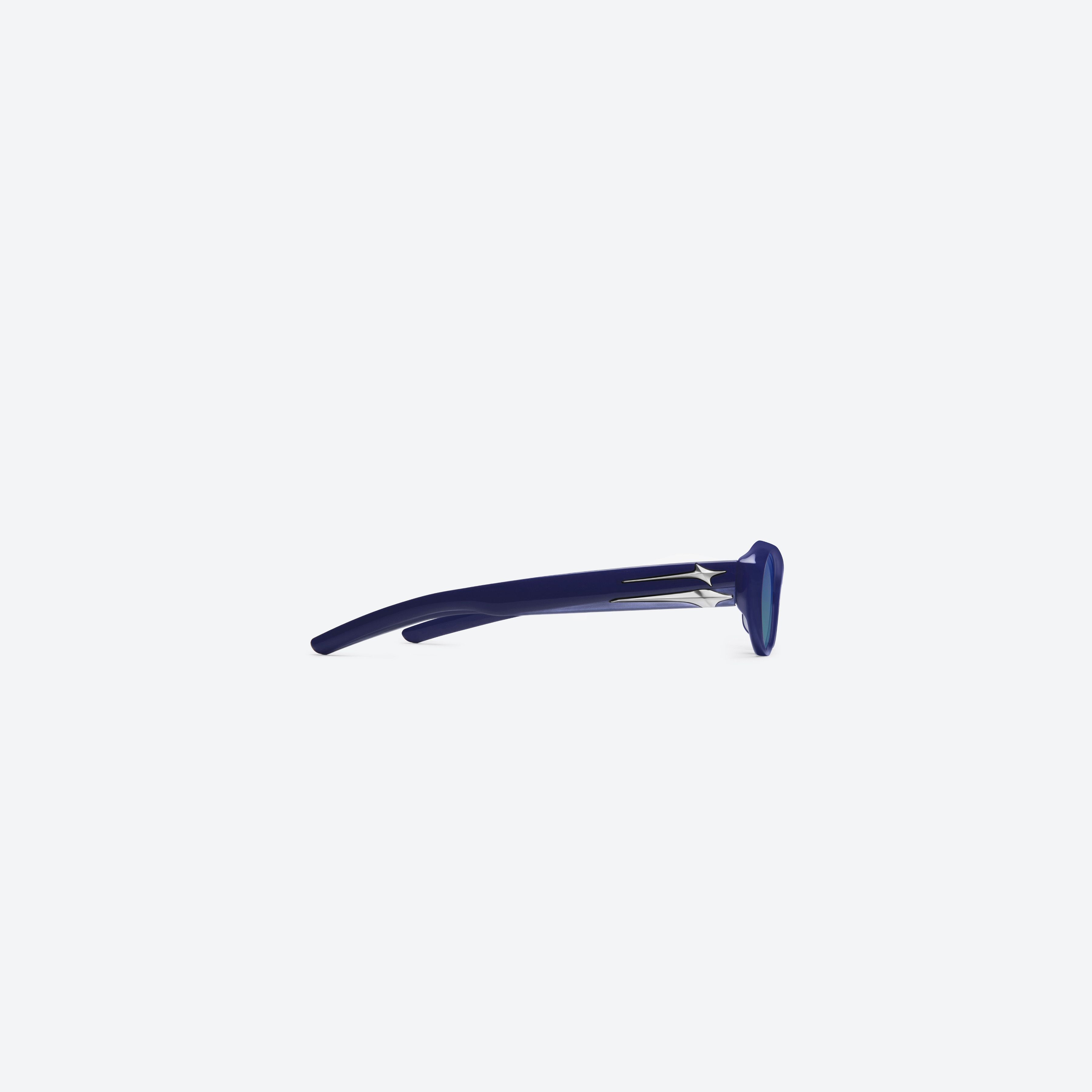 A detailed right view of Gentle Monster Eq BL6 Blue Acetate framed Cat-eye sunglasses.