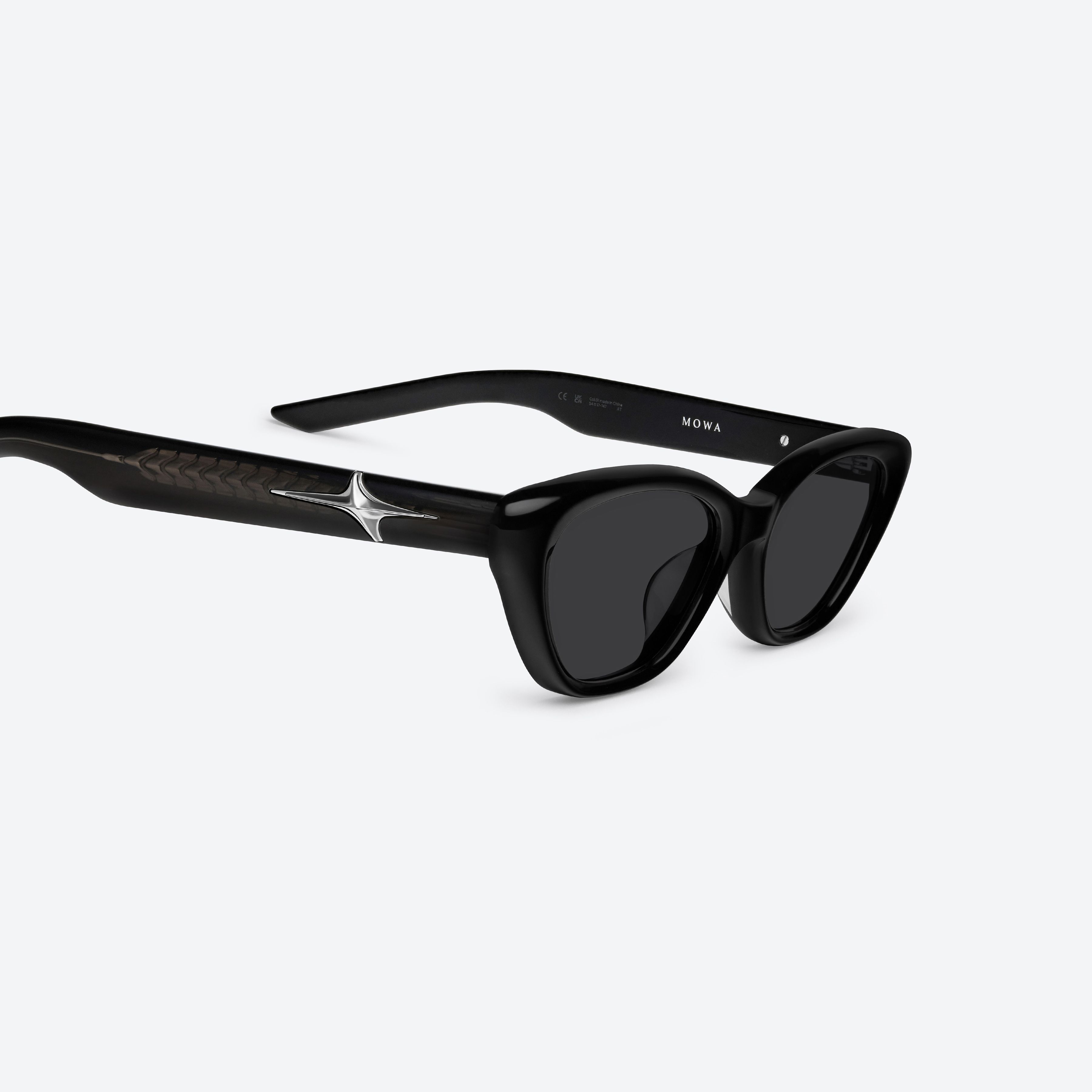 45-degree detailed view of Gentle Monster Mowa 01 Black Acetate framed Cat-eye sunglasses.