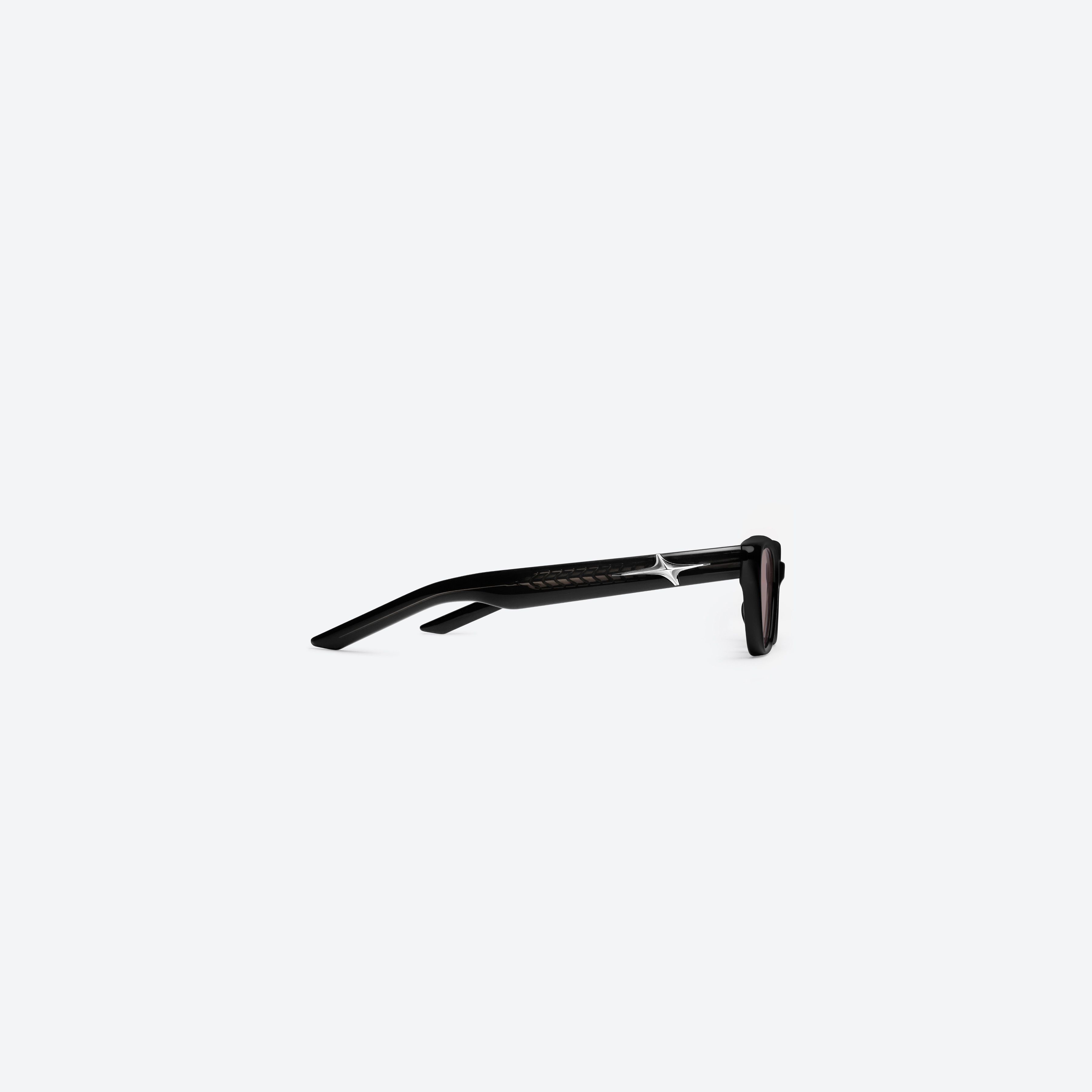 A detailed right view of Gentle Monster Mowa 01(R) Black Acetate framed Cat-eye sunglasses.