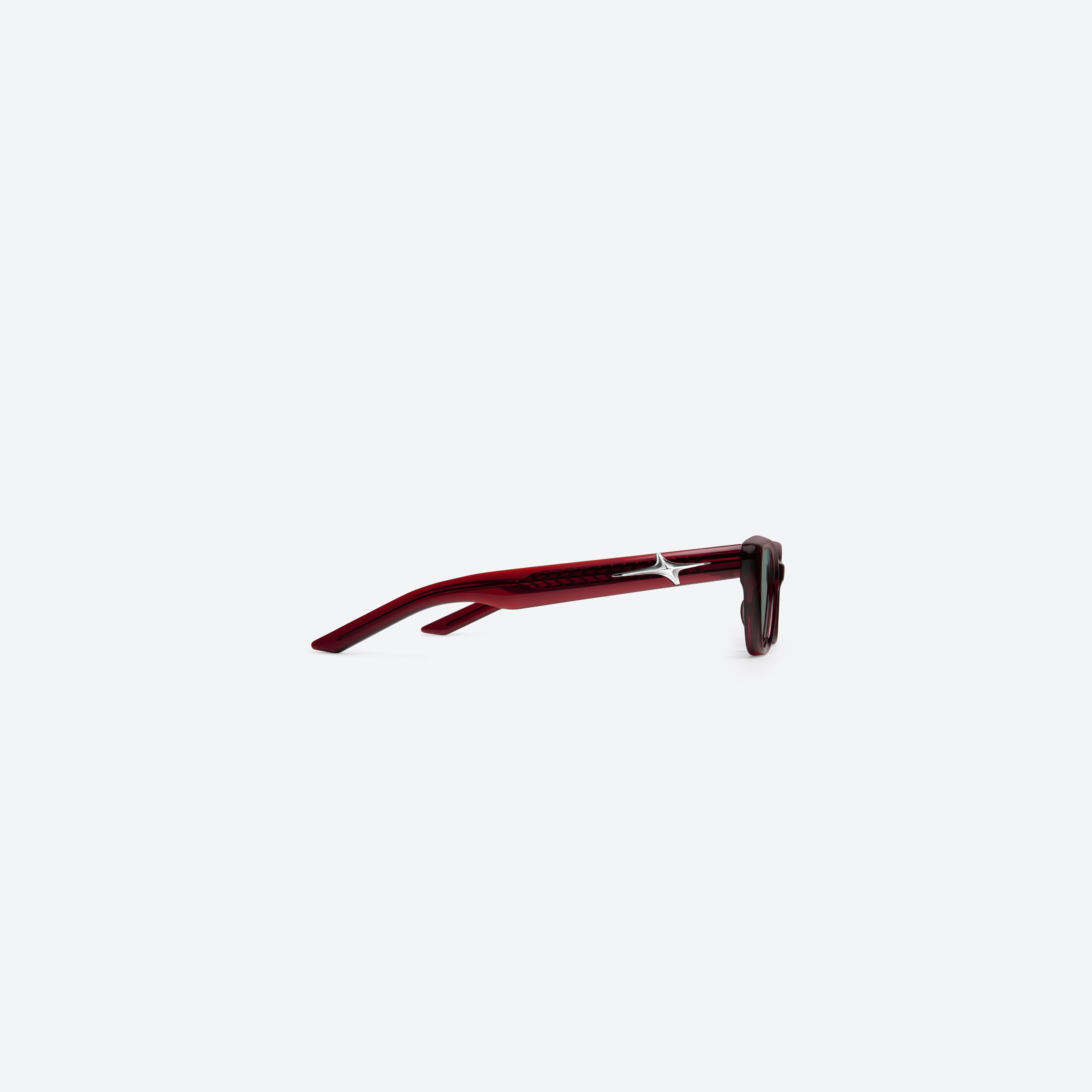 A detailed right view of Gentle Monster Mowa RC3 Red Acetate framed Cat-eye sunglasses.