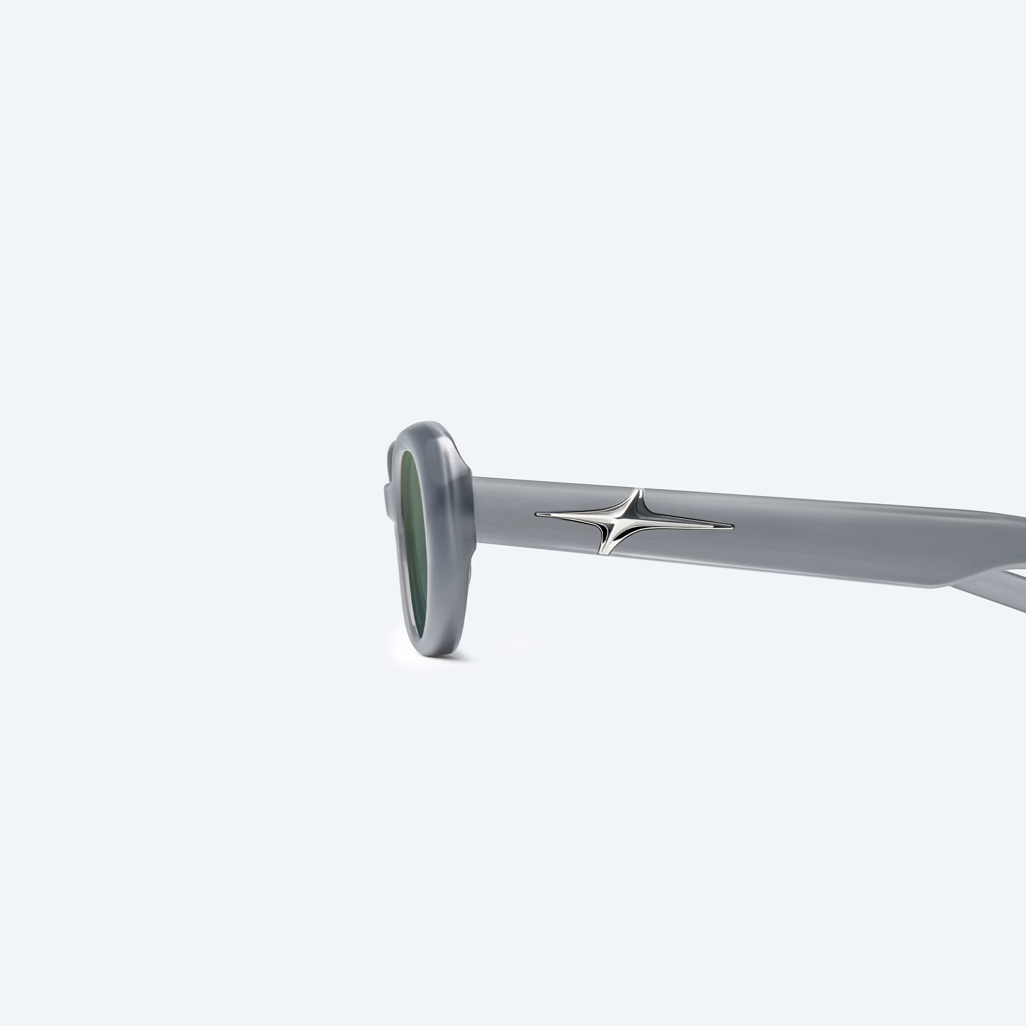 A detailed left view of Gentle Monster Loco G13 Gray Acetate framed Oval sunglasses.