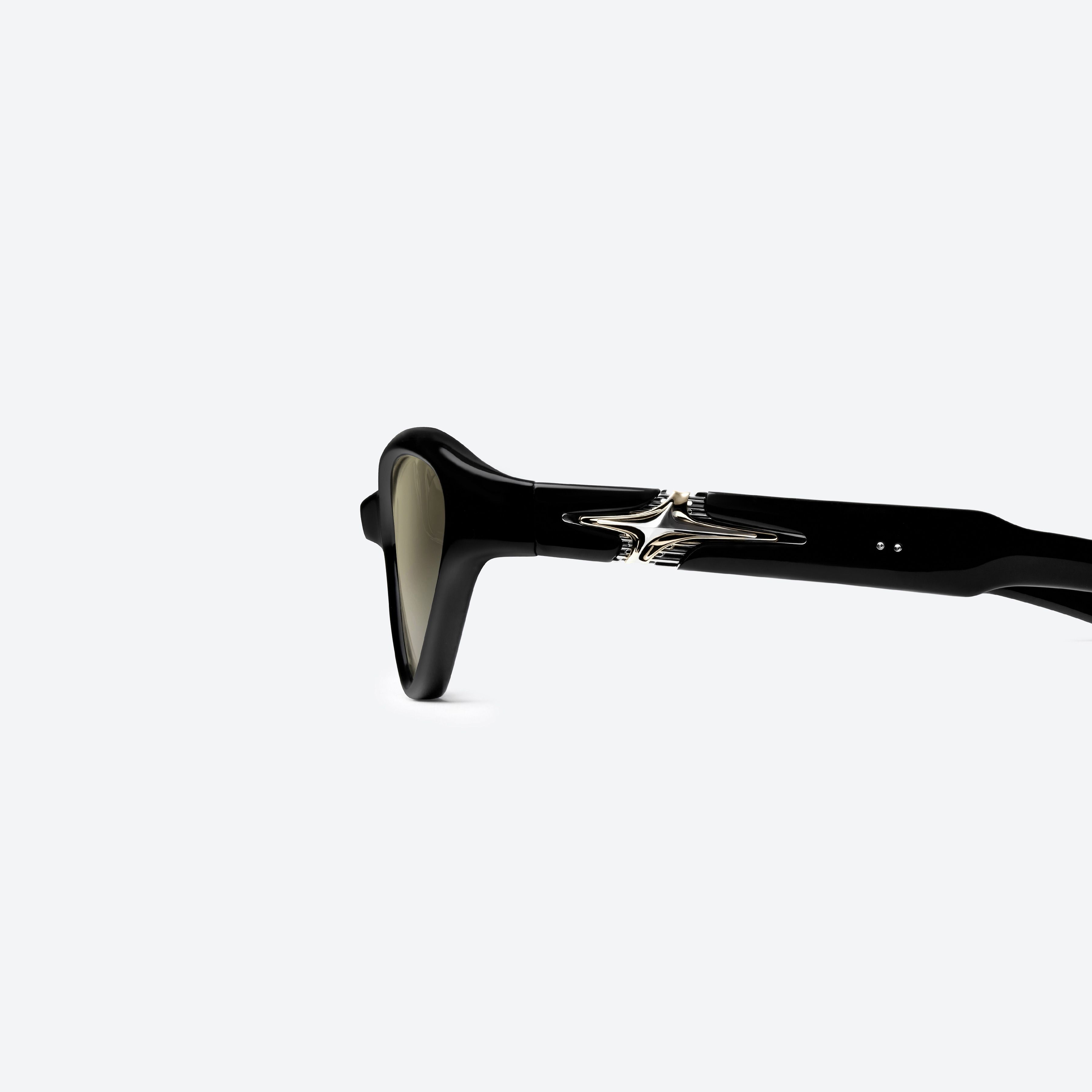 A detailed left view of Gentle Monster Rage 01 Black Mixed framed Cat-eye glasses.