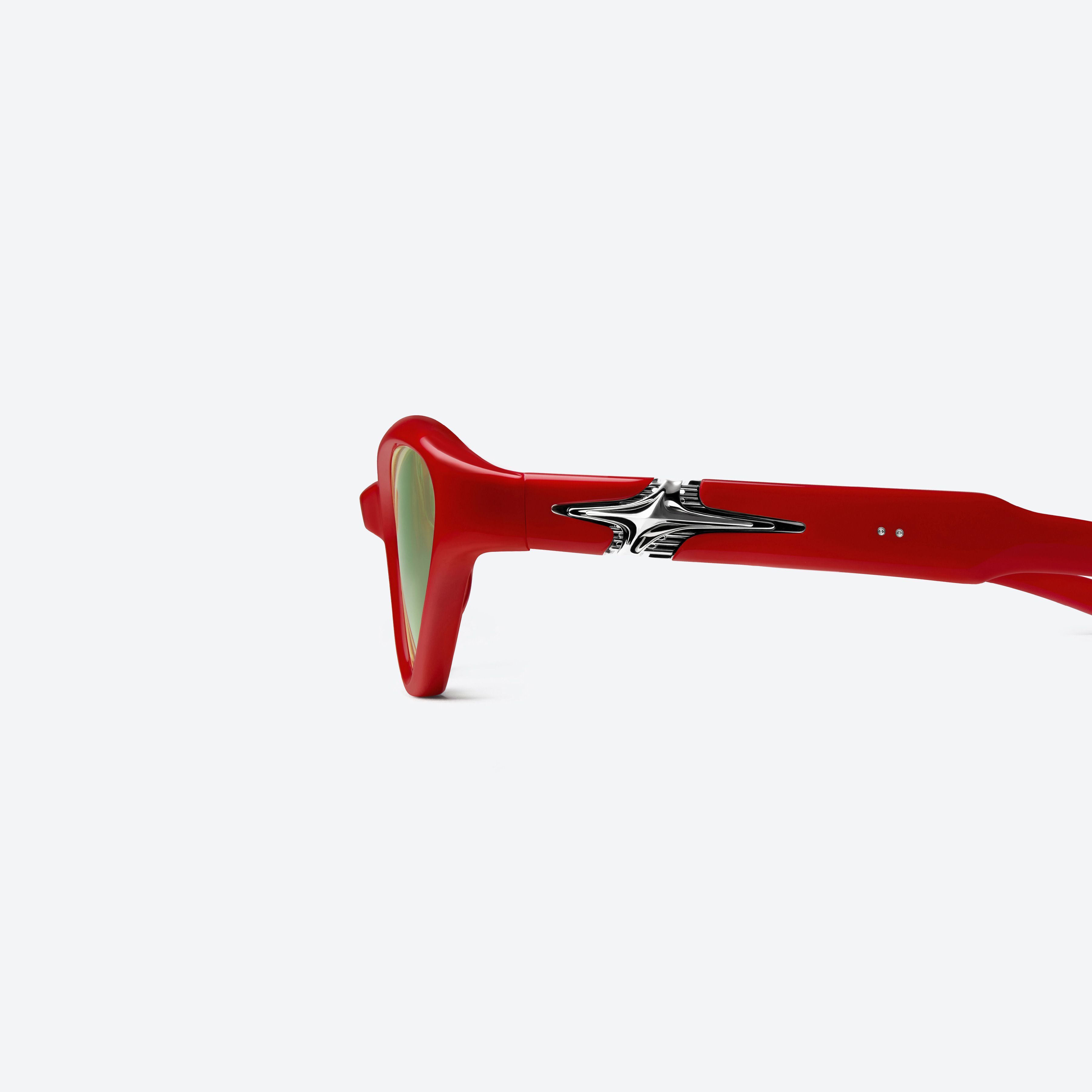 A detailed left view of Gentle Monster Rage R10 Red Mixed framed Cat-eye glasses.