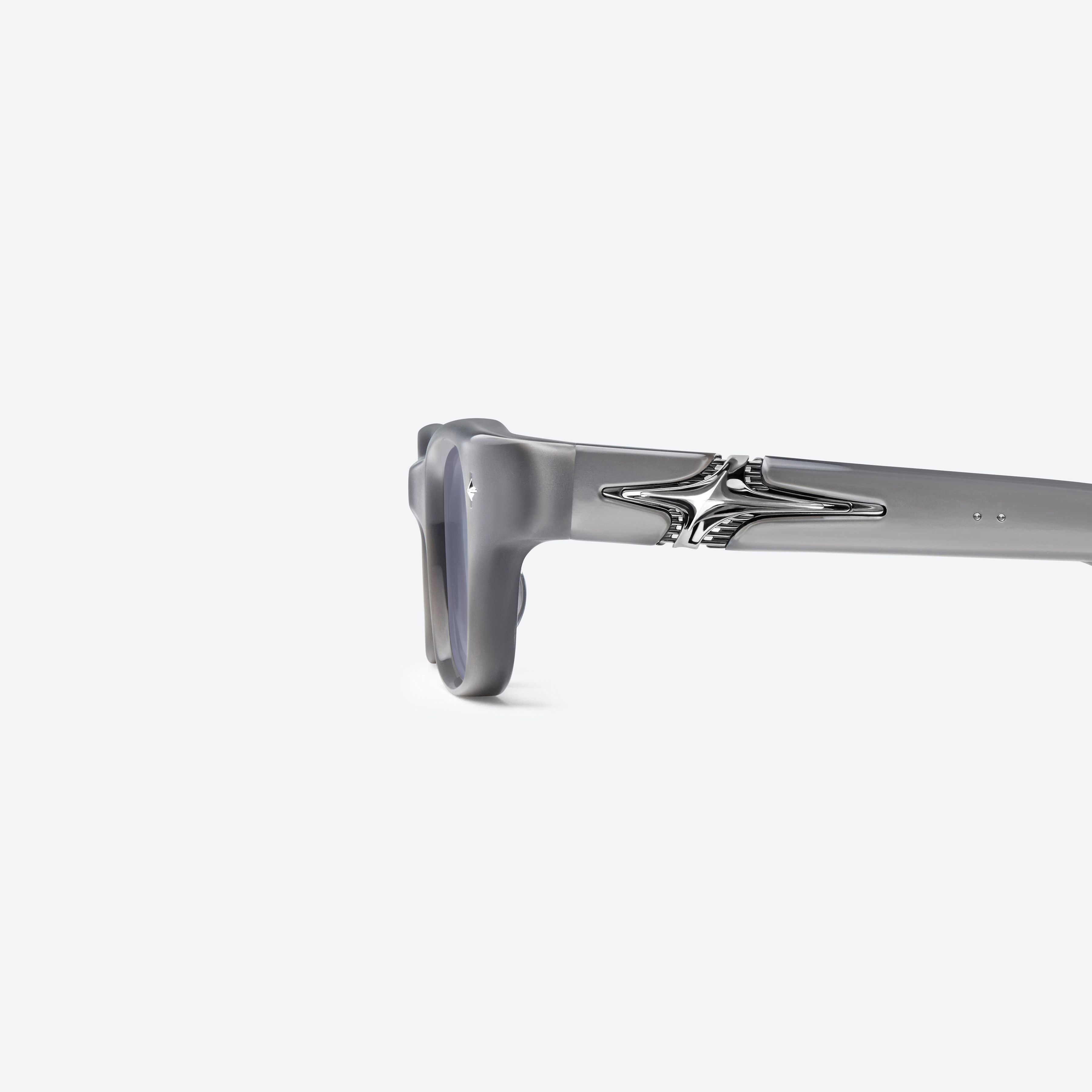 A detailed left view of Gentle Monster Kant G13 Gray Mixed framed Square glasses.