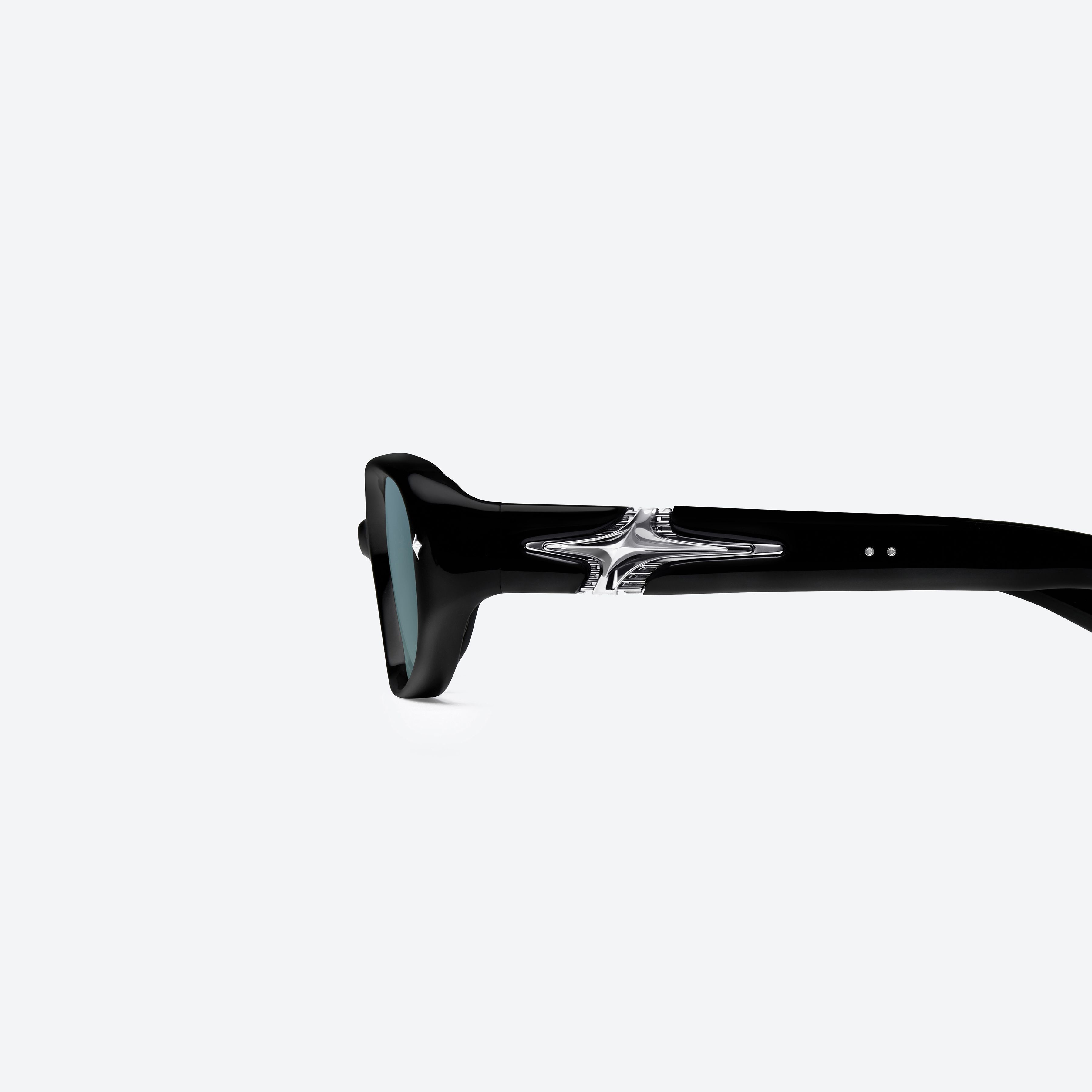 A detailed left view of Gentle Monster Kafka 01(BL) Black Mixed framed Square glasses.