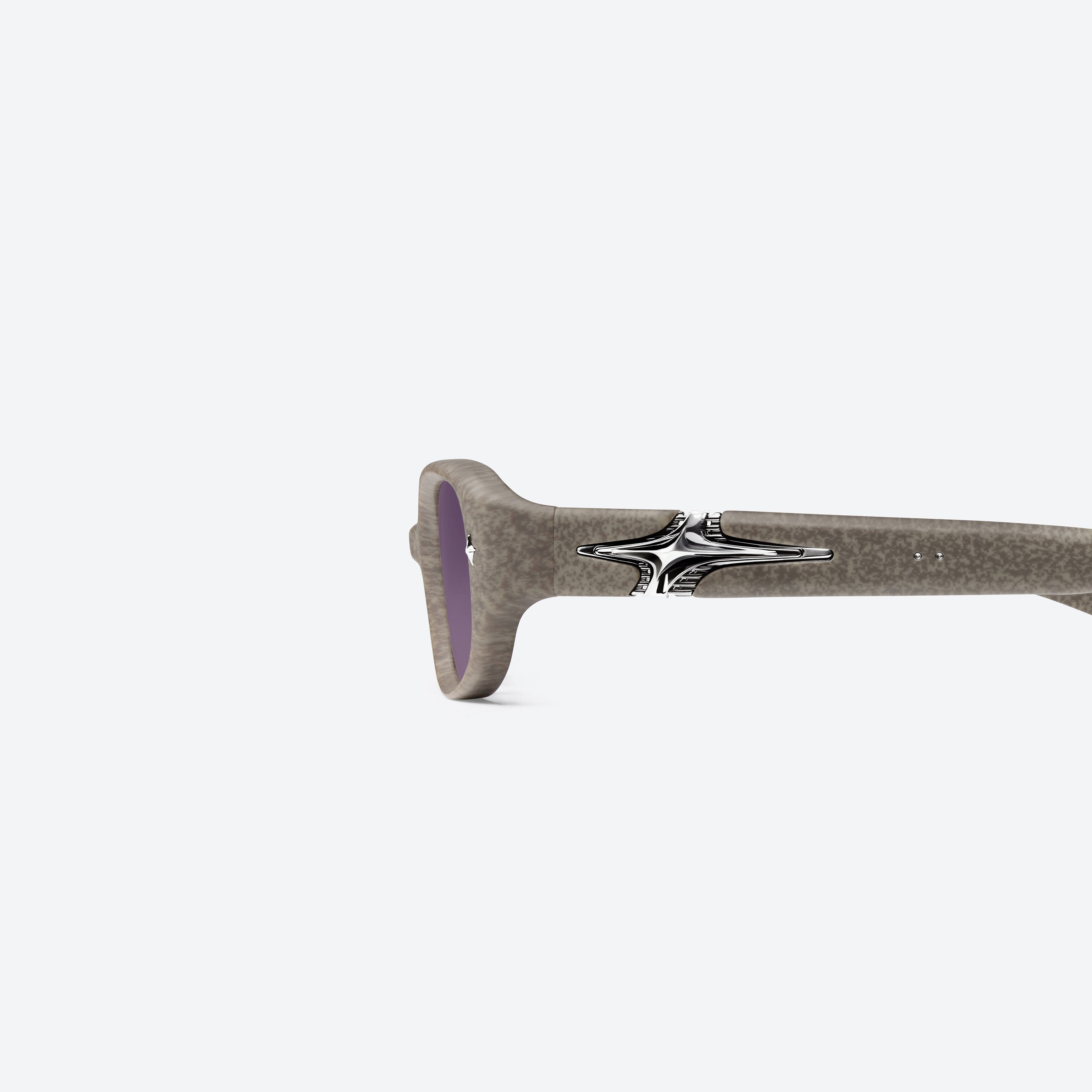 A detailed left view of Gentle Monster Kafka BRD1 Brown Mixed framed Square glasses.