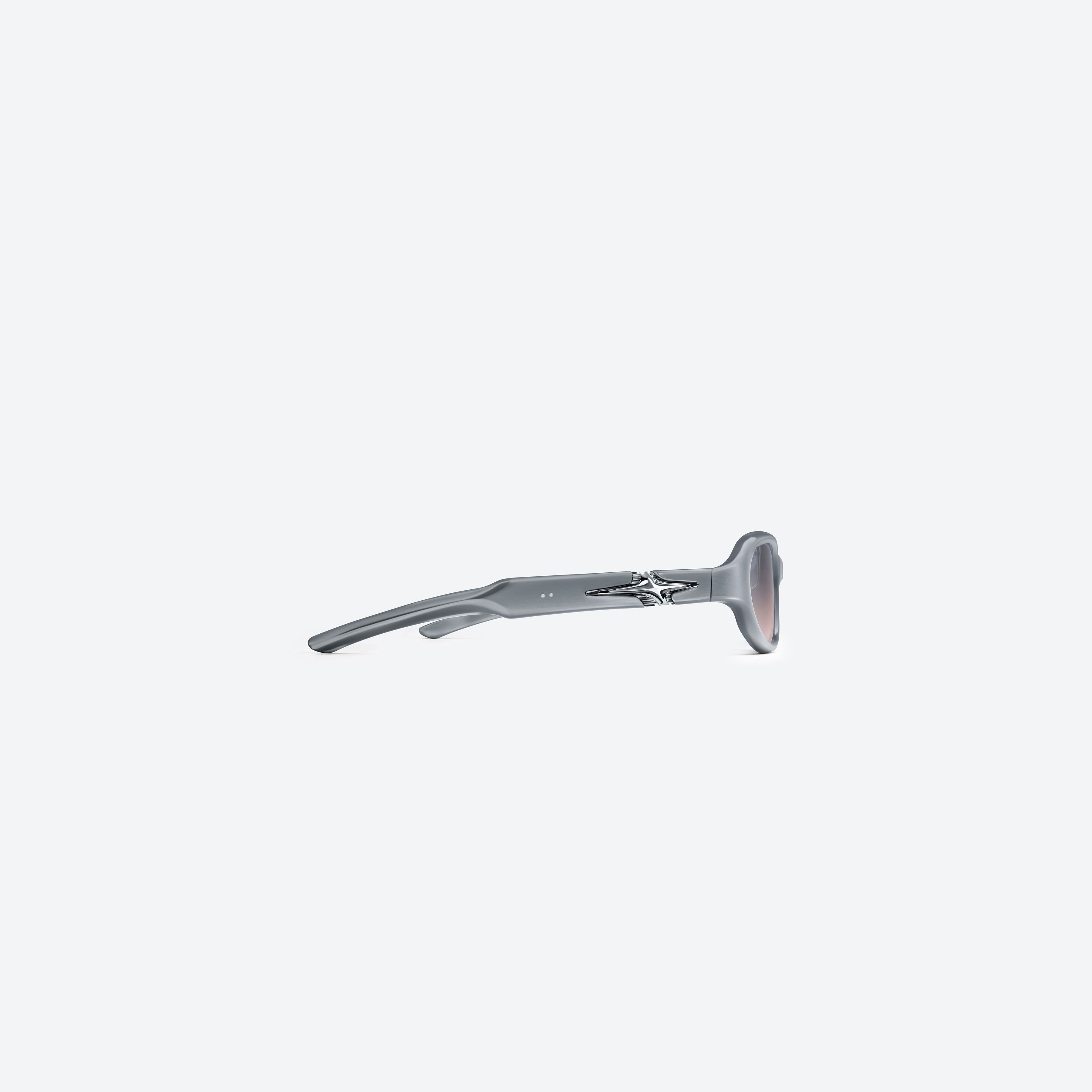 A detailed right view of Gentle Monster Soma G13 Gray Mixed framed Round glasses.