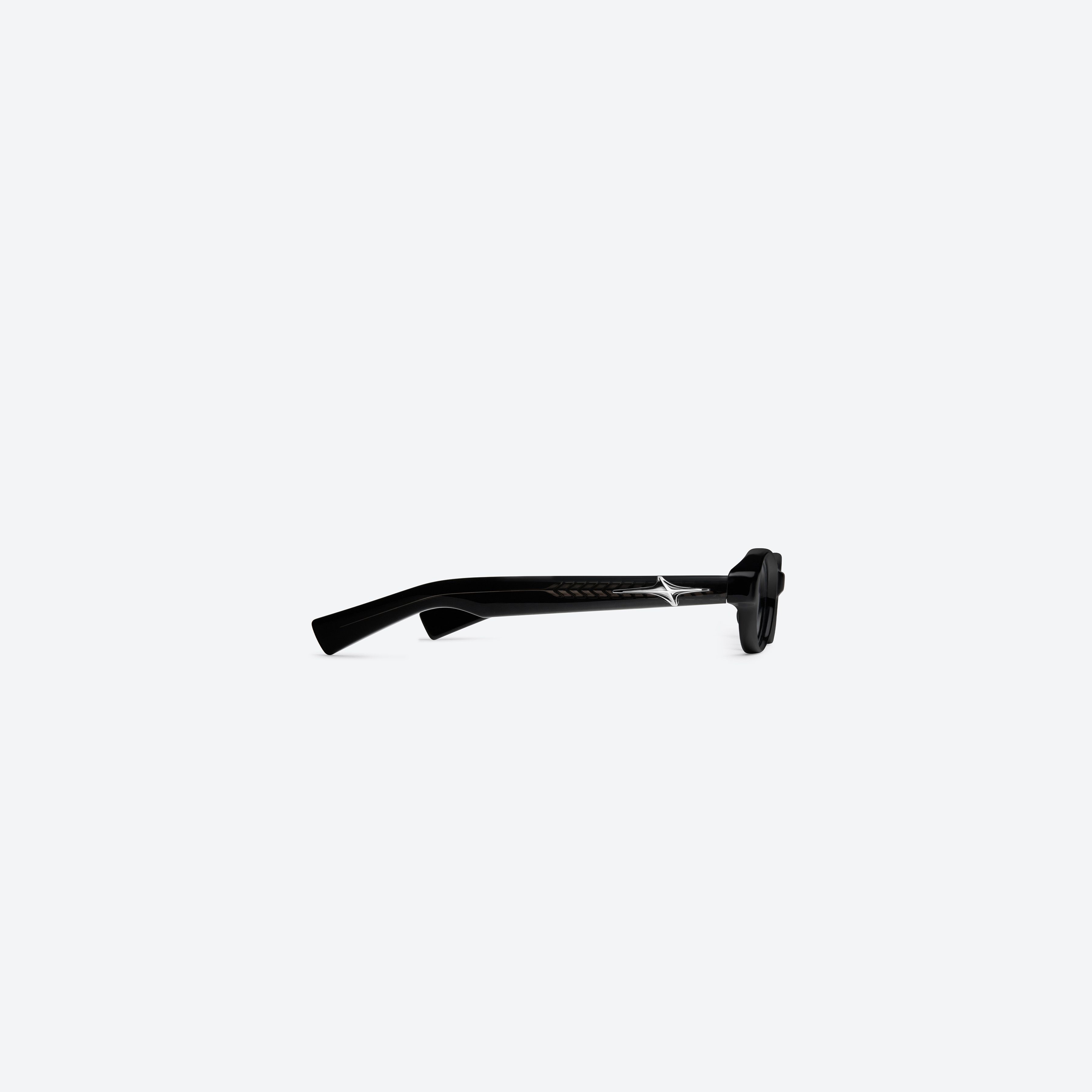 A detailed right view of Gentle Monster Odd 01 Black Acetate framed Oval glasses.