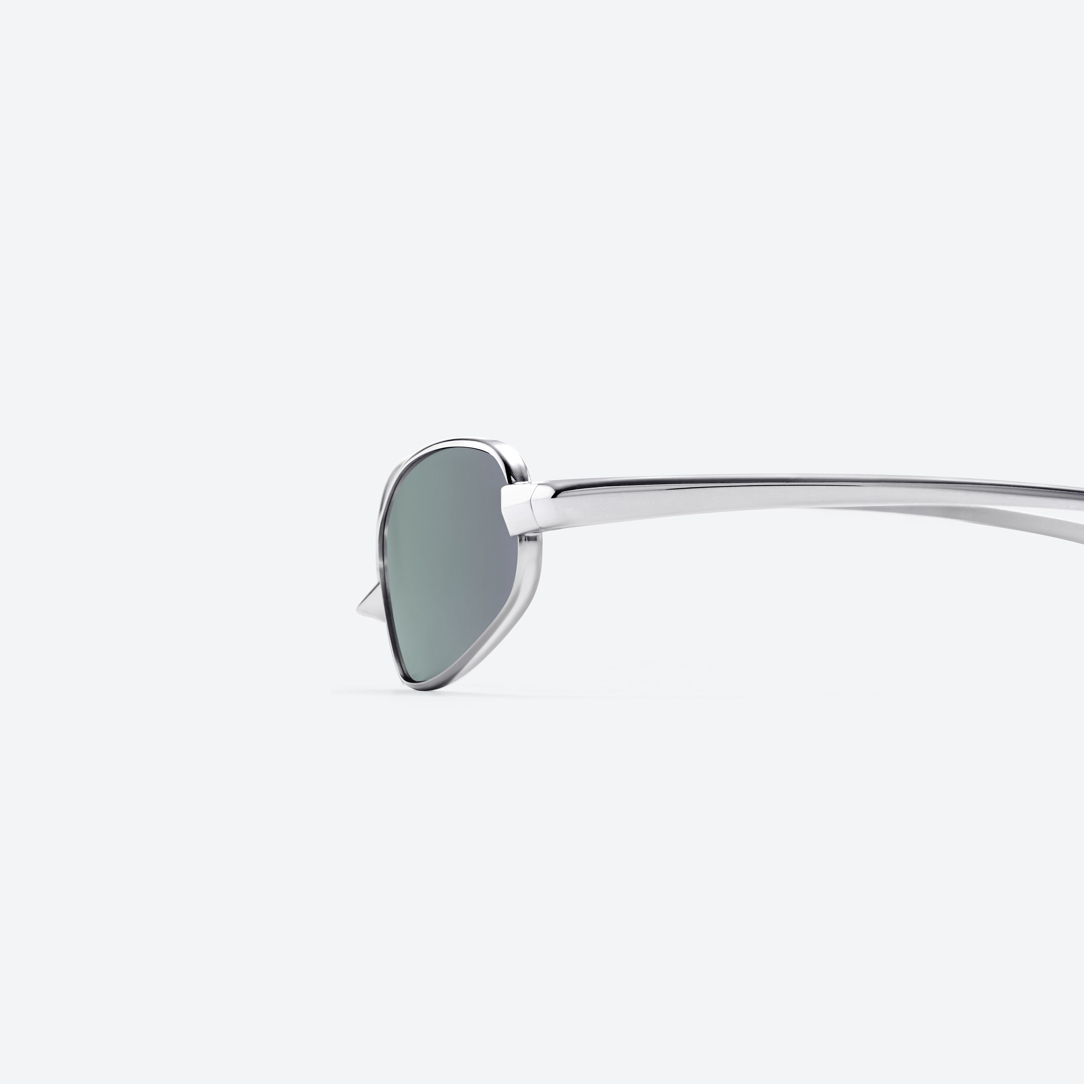 A detailed left view of Gentle Monster Brutal 02 Silver Metal framed Square sunglasses.