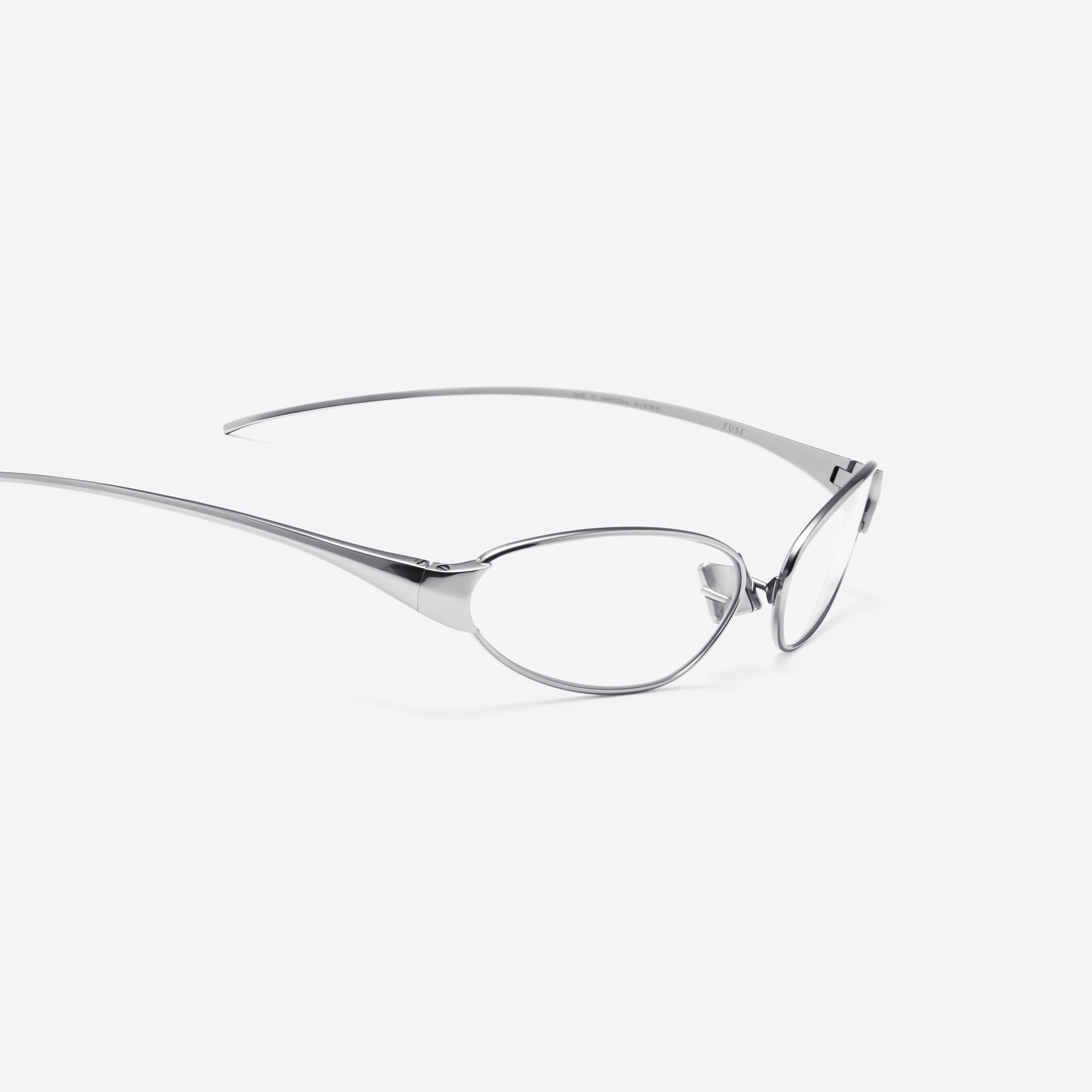 45-degree detailed view of Gentle Monster Fuse 02 Silver Metal framed Cat-eye glasses.