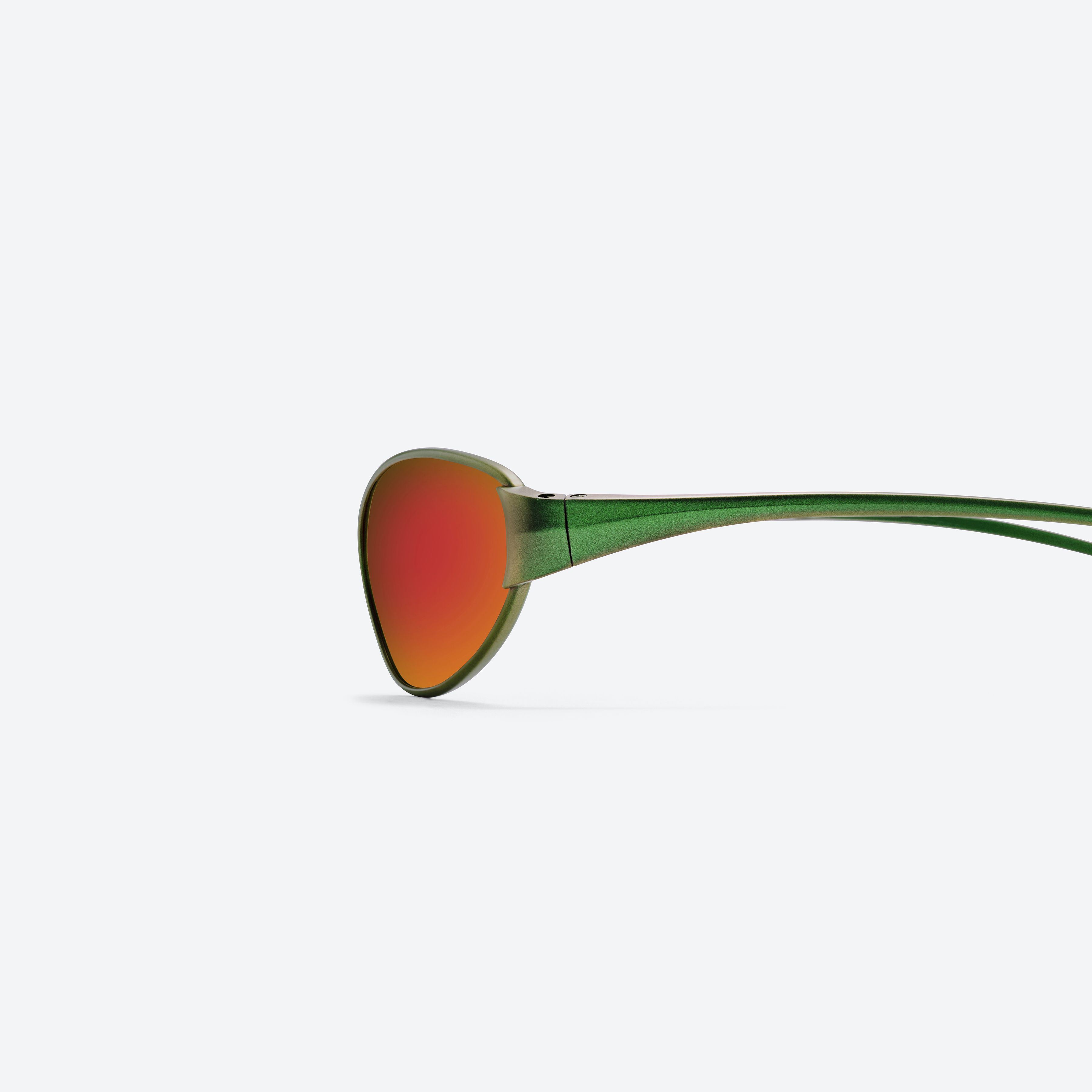 A detailed left view of Gentle Monster Fuse MGR1 Green Metal framed Cat-eye glasses.