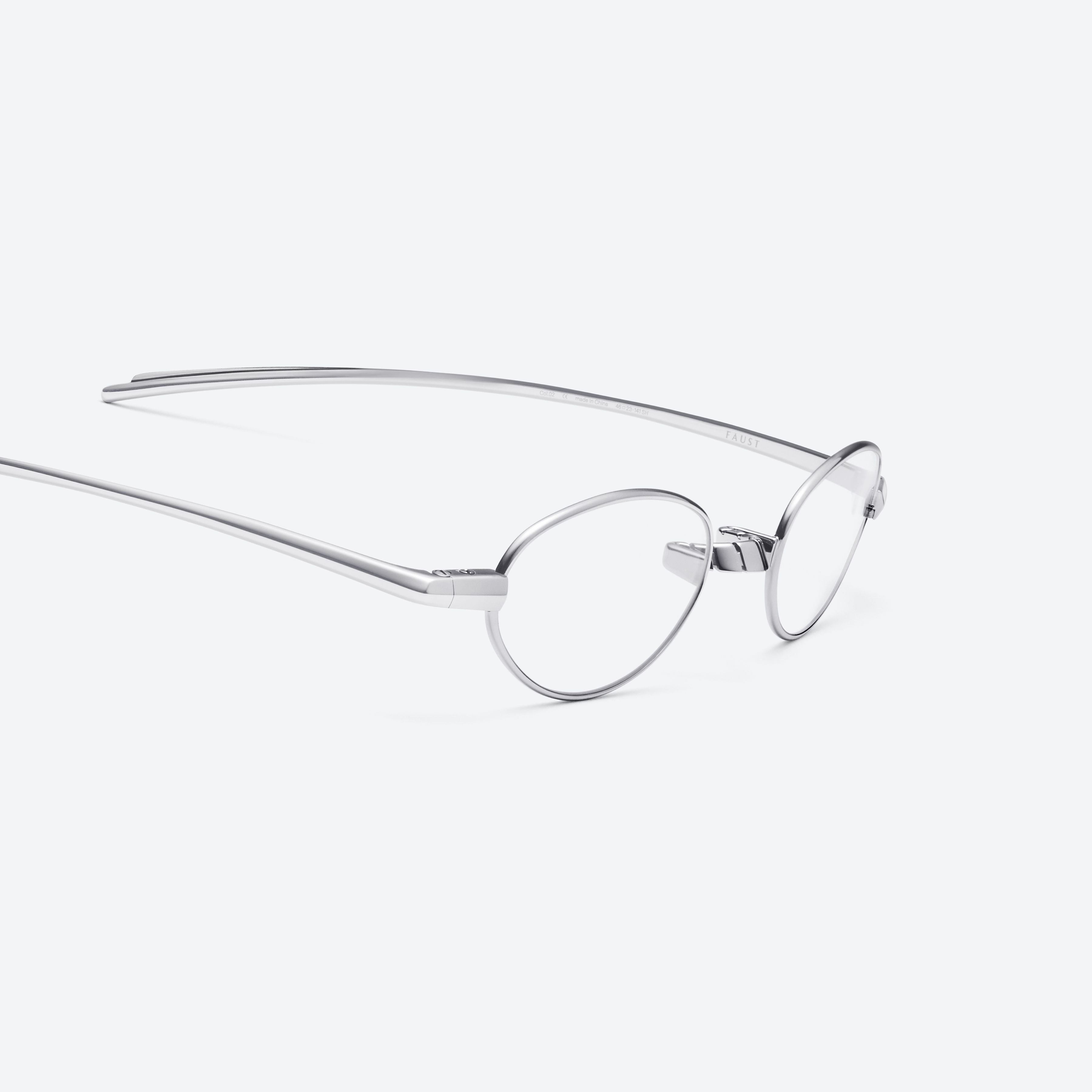 45-degree detailed view of Gentle Monster Faust 02 Silver Metal framed Oval glasses.