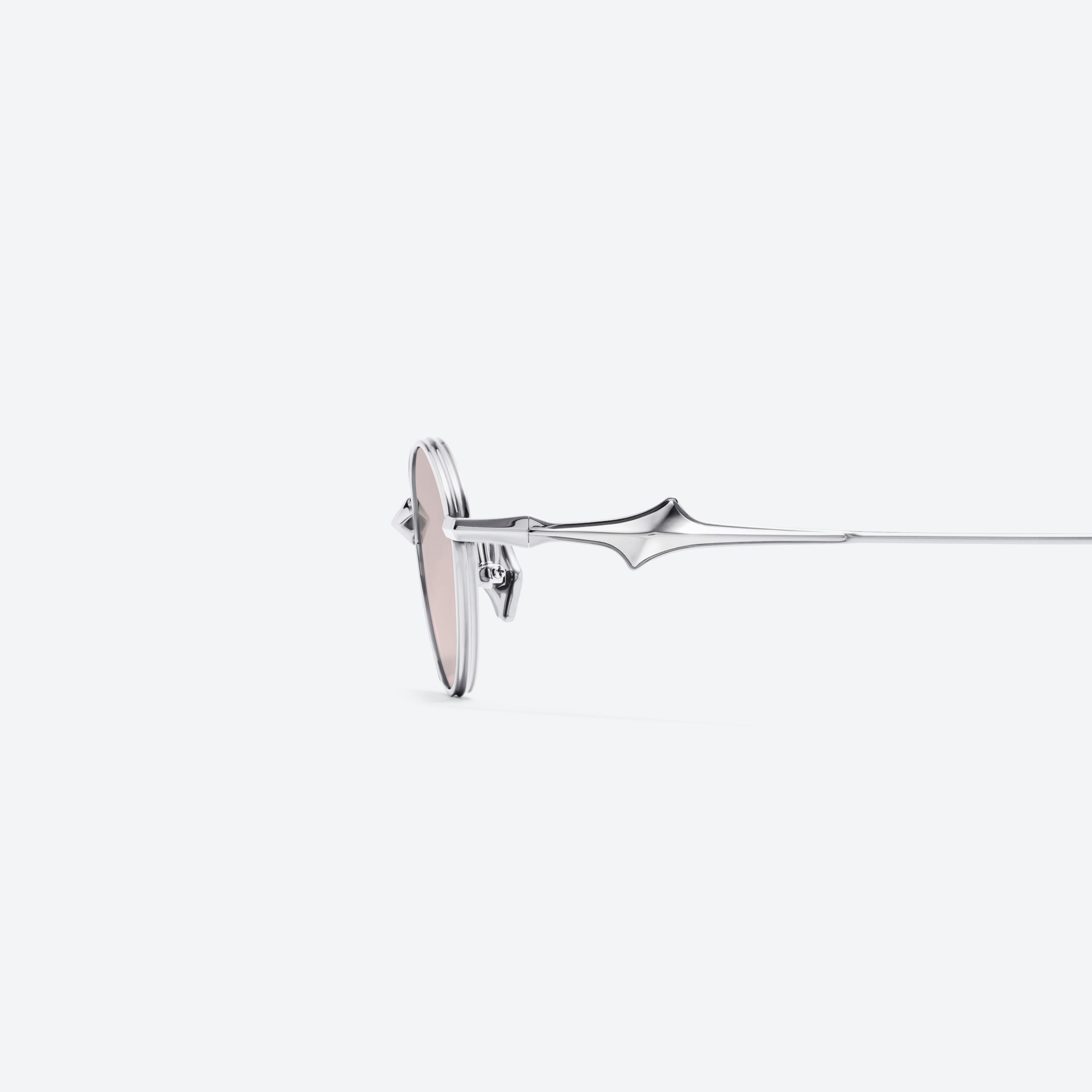 A detailed left view of Gentle Monster Eden 02(BR) Silver Metal framed Oval glasses.