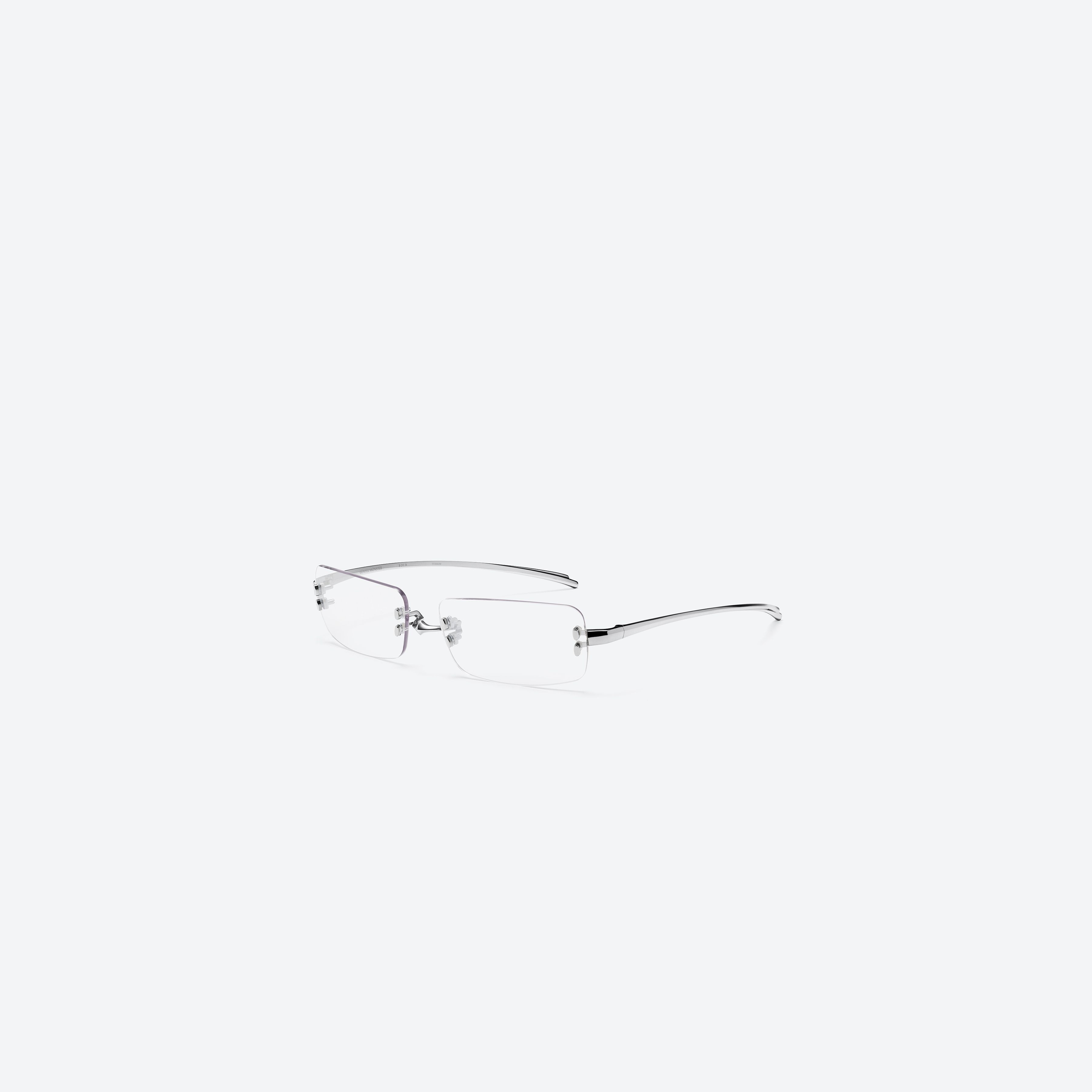 45-degree view of Gentle Monster Paranoyd 02 Similar Silver Metal framed Square glasses.