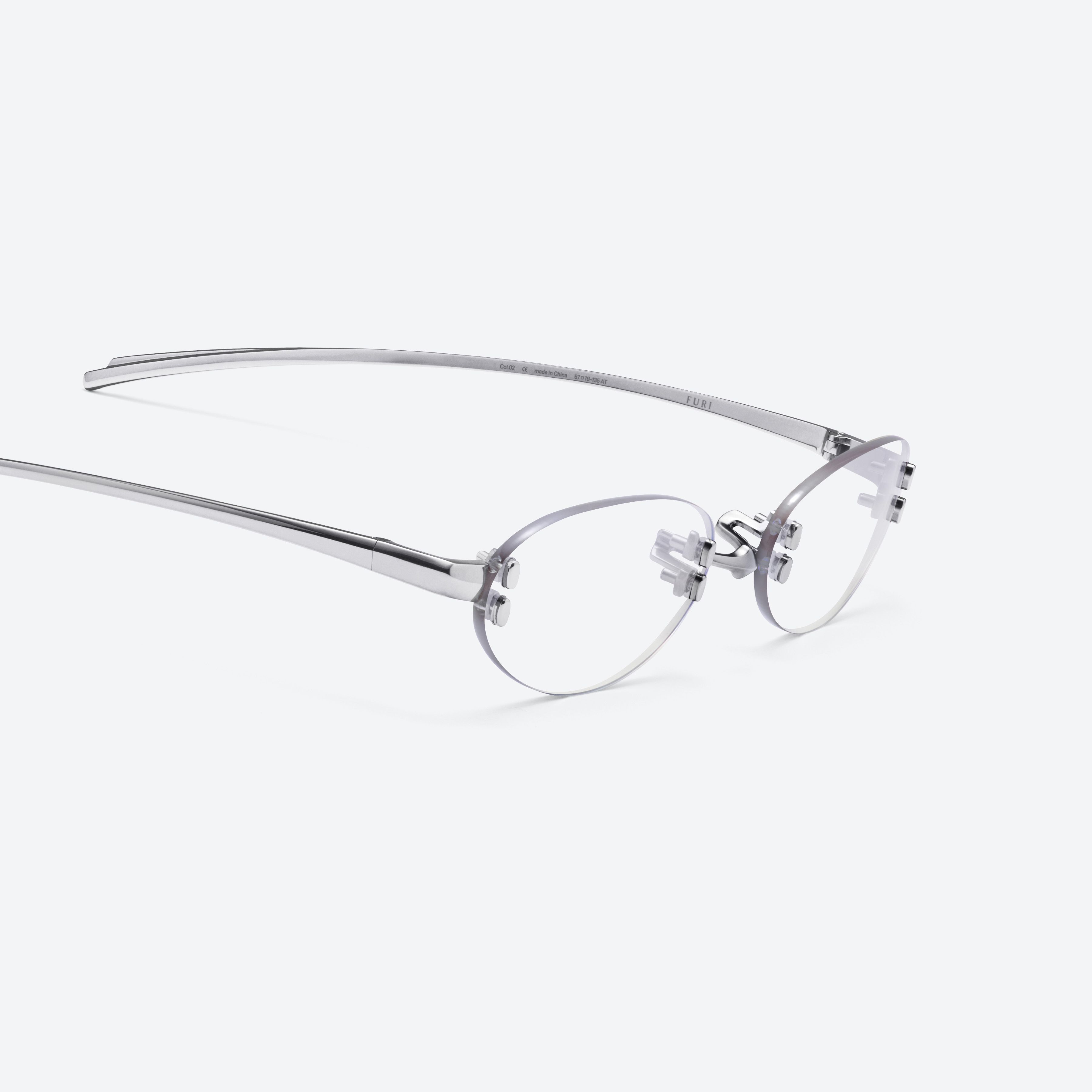 45-degree detailed view of Gentle Monster Furi 02 Silver Metal framed Oval glasses.