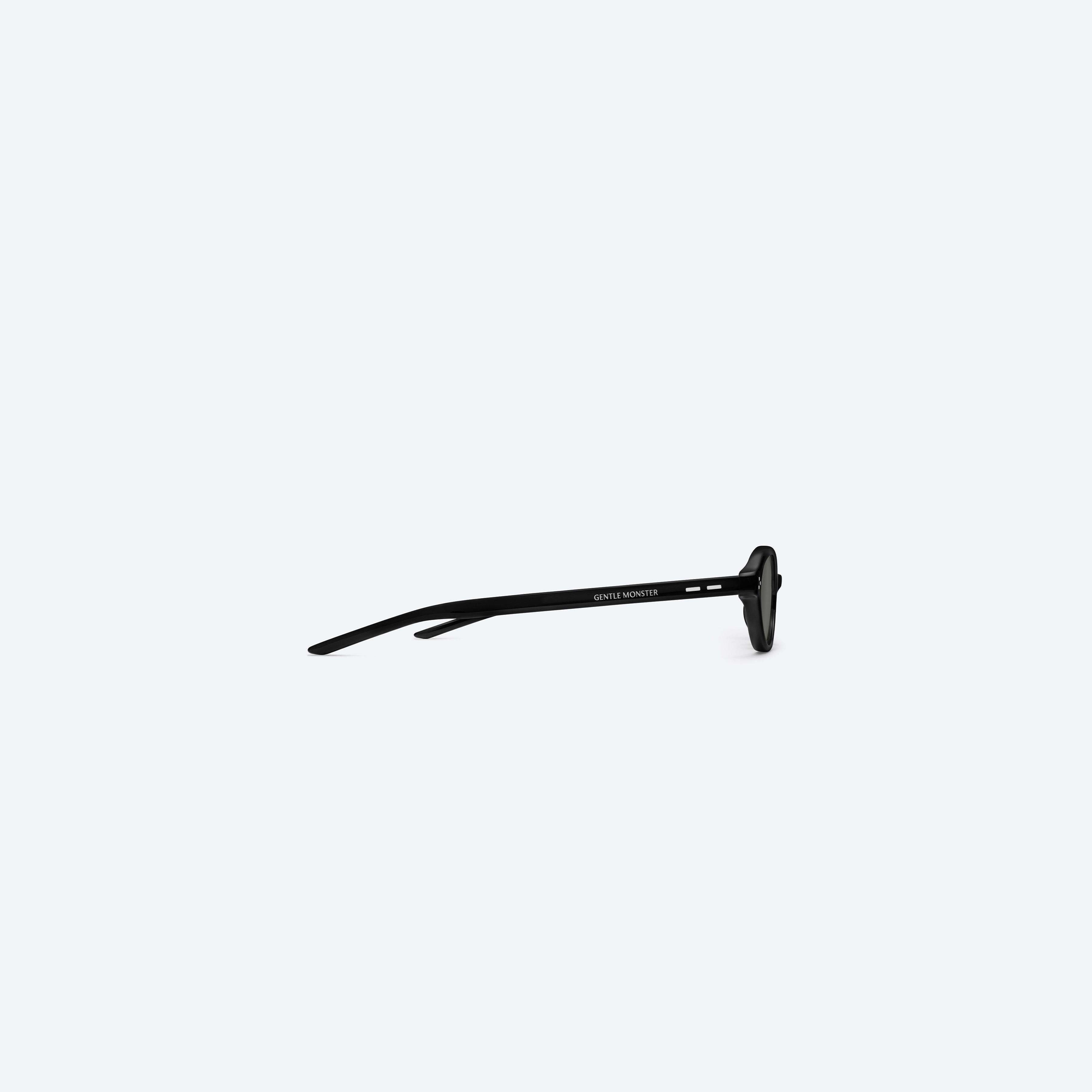 A detailed right view of Gentle Monster La Cha 01 Black Acetate framed Round sunglasses.