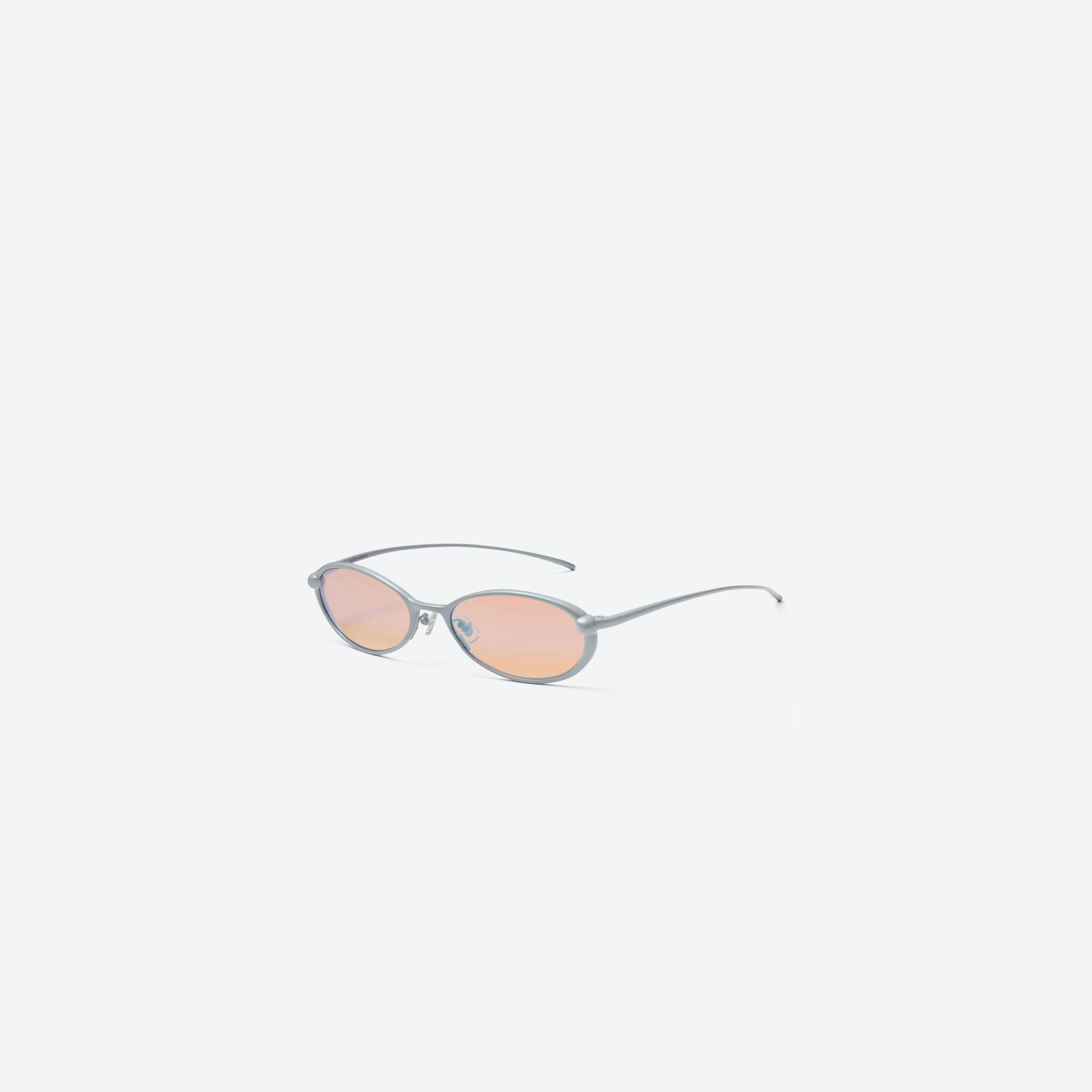 45-degree view of Gentle Monster Boba BL8 Blue Metal framed Round sunglasses.