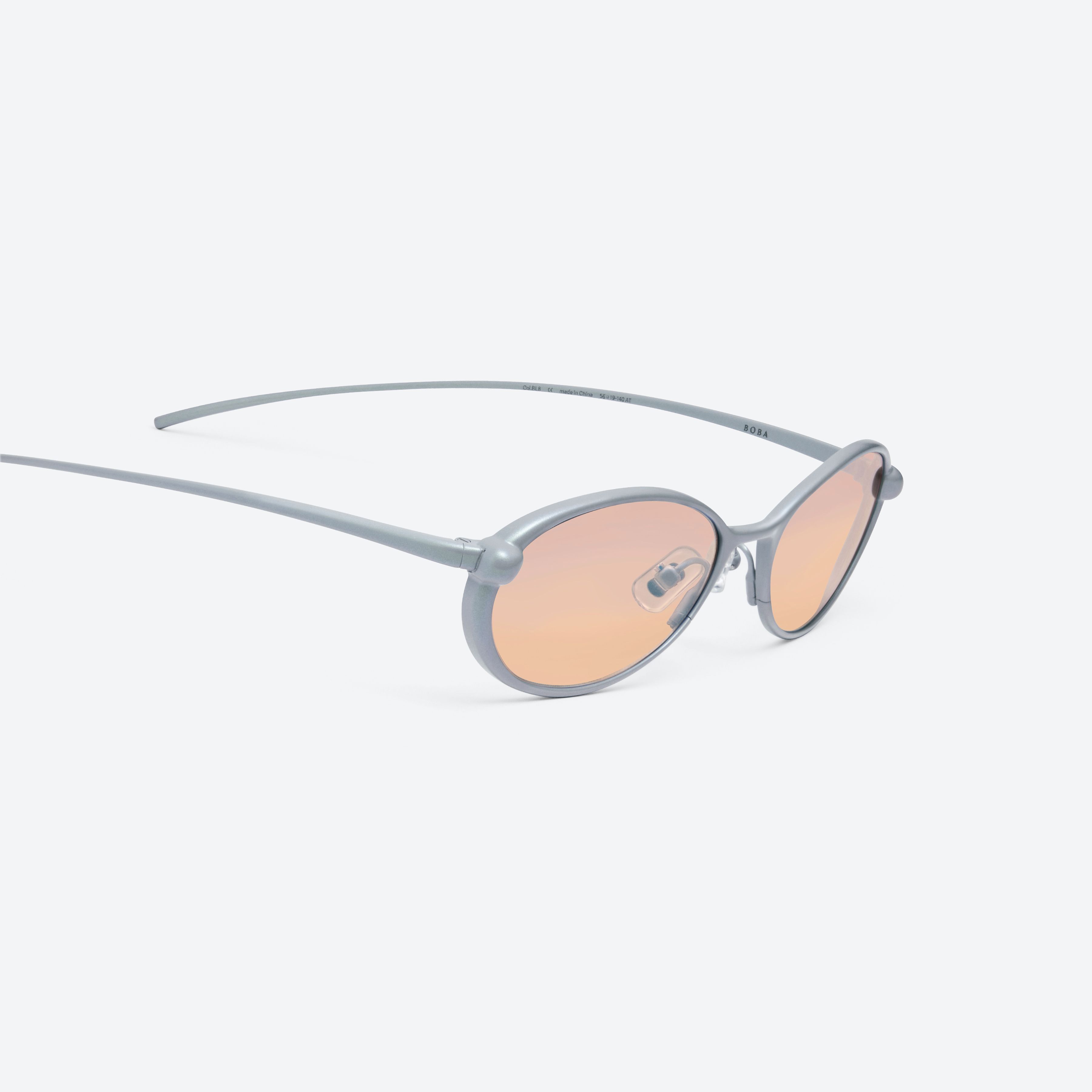 45-degree detailed view of Gentle Monster Boba BL8 Blue Metal framed Round sunglasses.