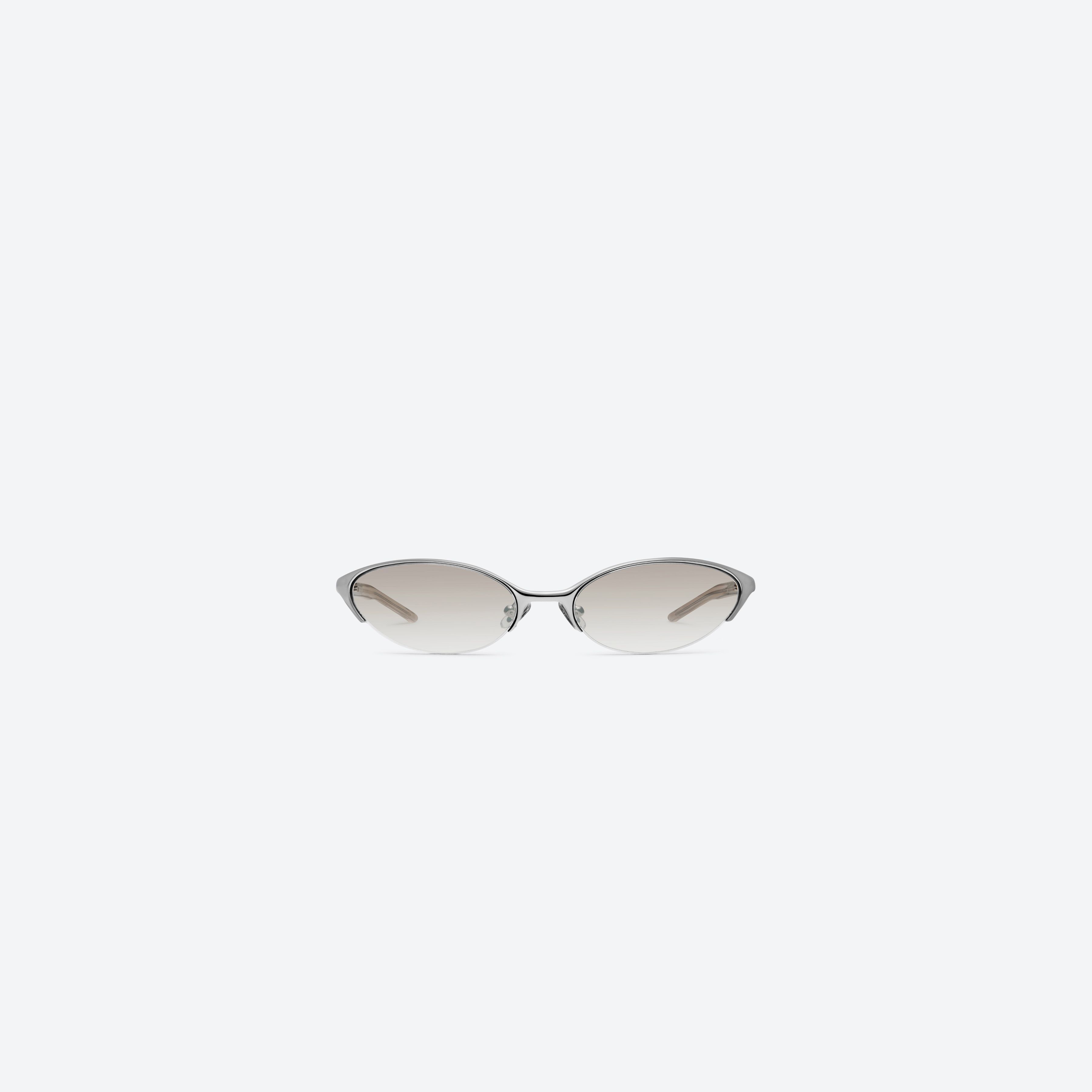 A front view of Gentle Monster Limes 02(BR) Similar Silver Mixed framed Cat-eye sunglasses.