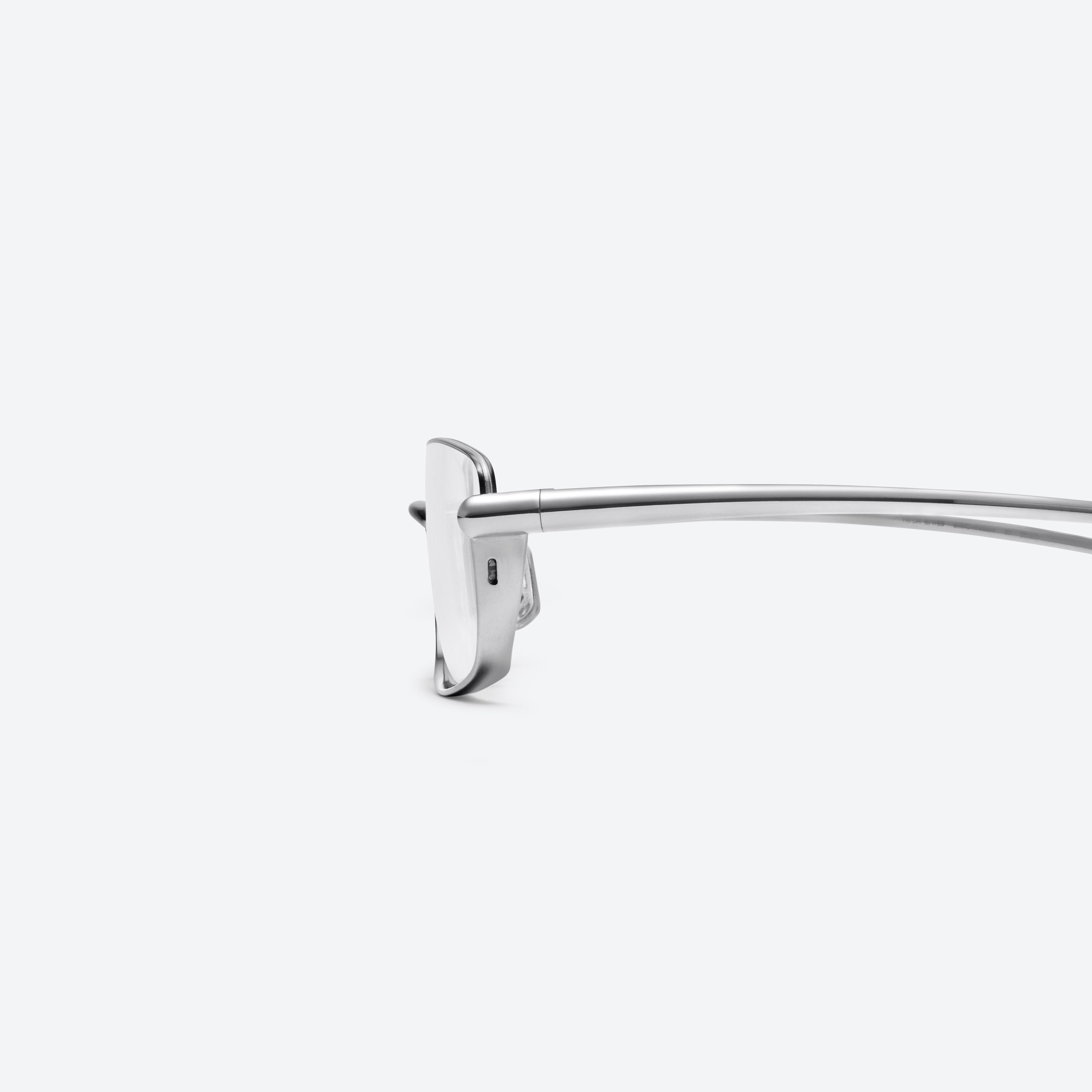 A detailed left view of Gentle Monster Heavenly 02 Silver Metal framed Square glasses.