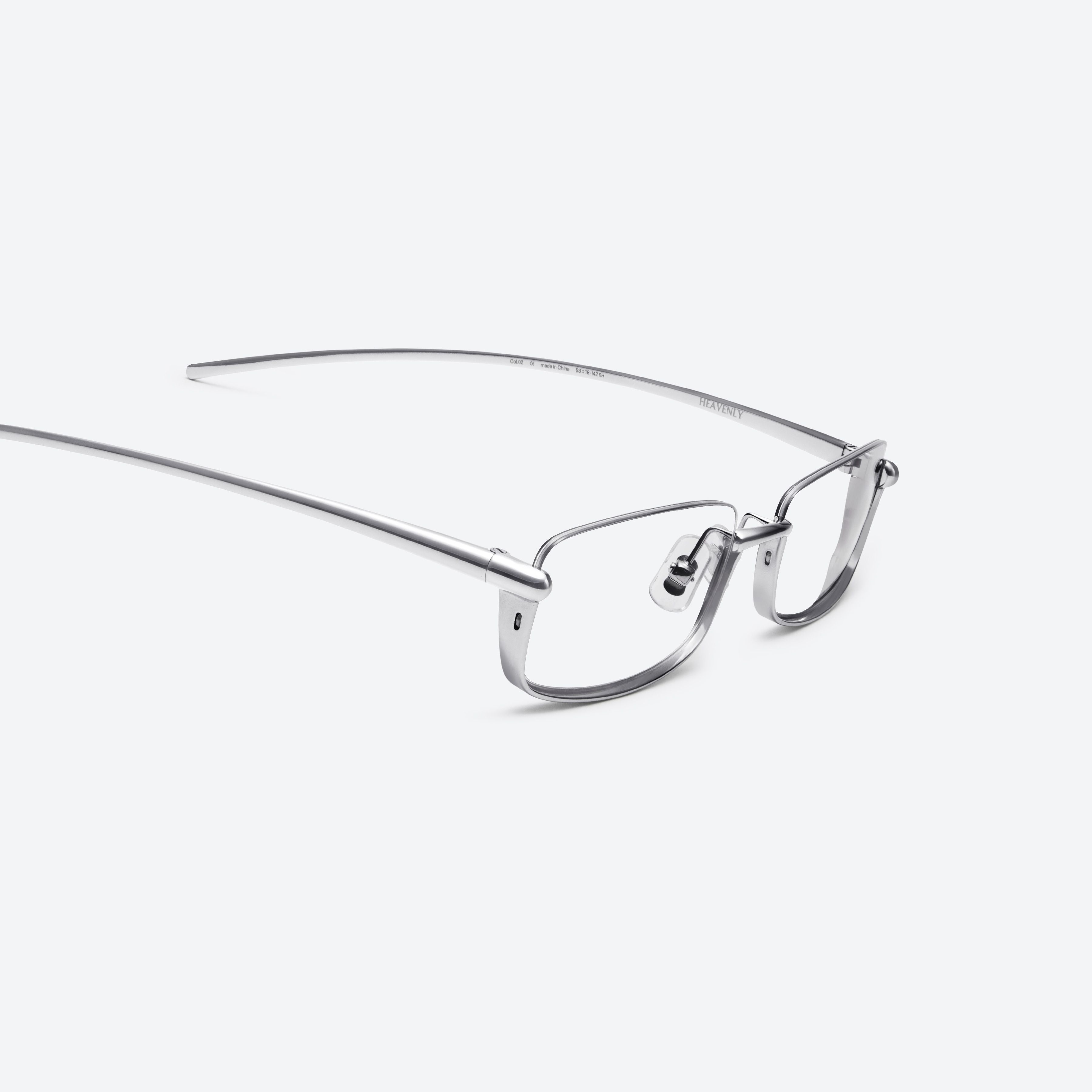 45-degree detailed view of Gentle Monster Heavenly 02 Silver Metal framed Square glasses.