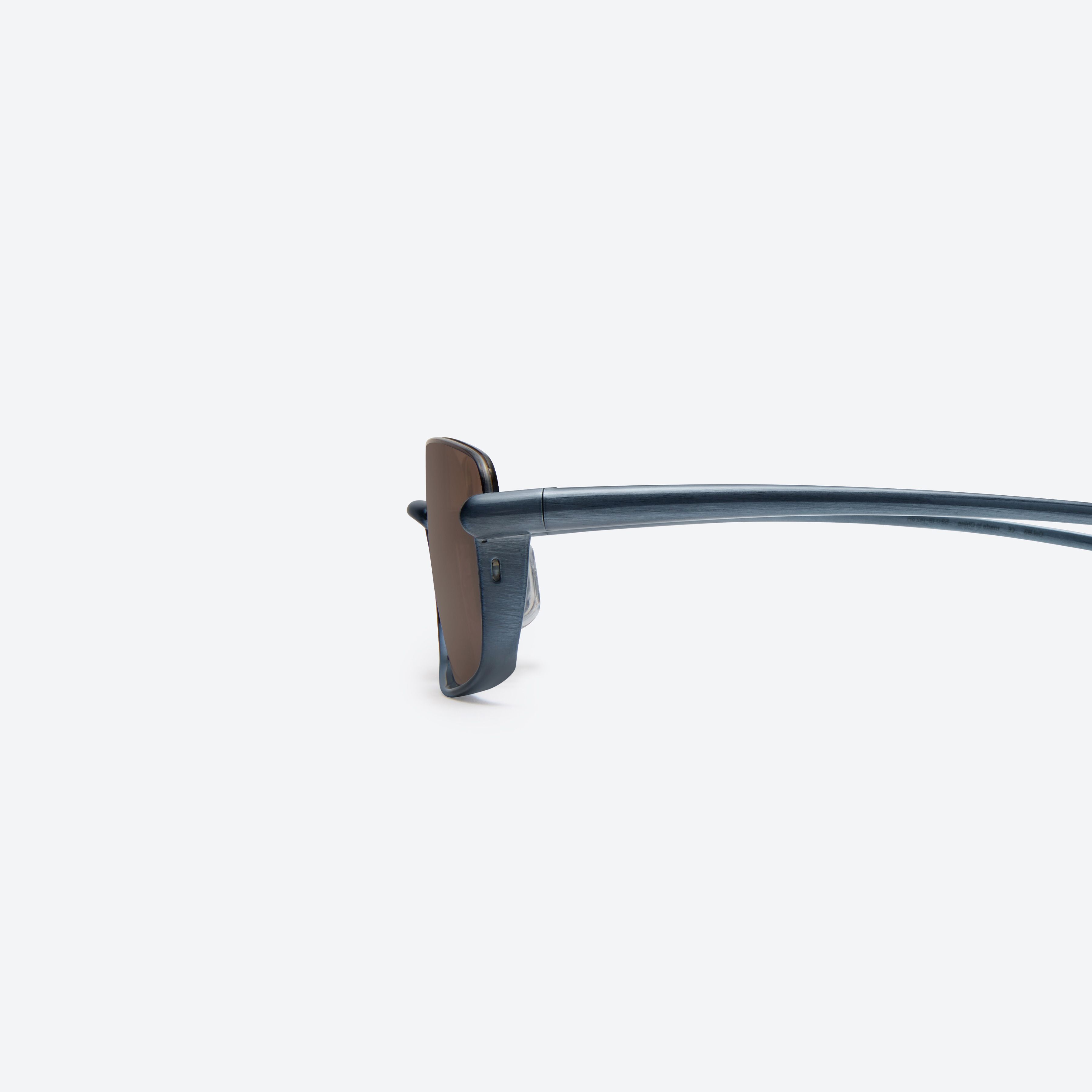 A detailed left view of Gentle Monster Heavenly B3 Blue Metal framed Square sunglasses.