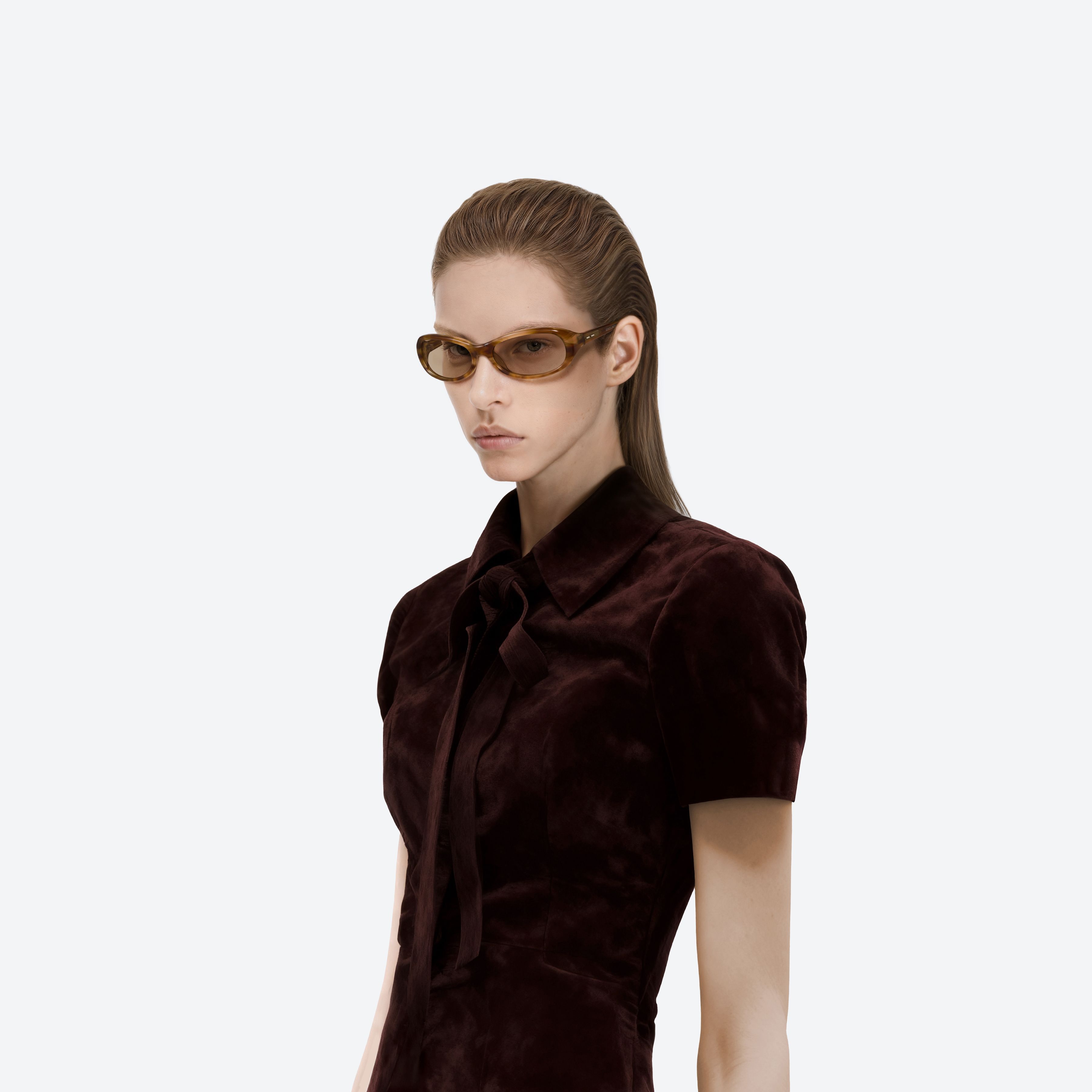 Model wearing the Groovy T8 Tortoise Acetate framed Wraparound sunglasses.