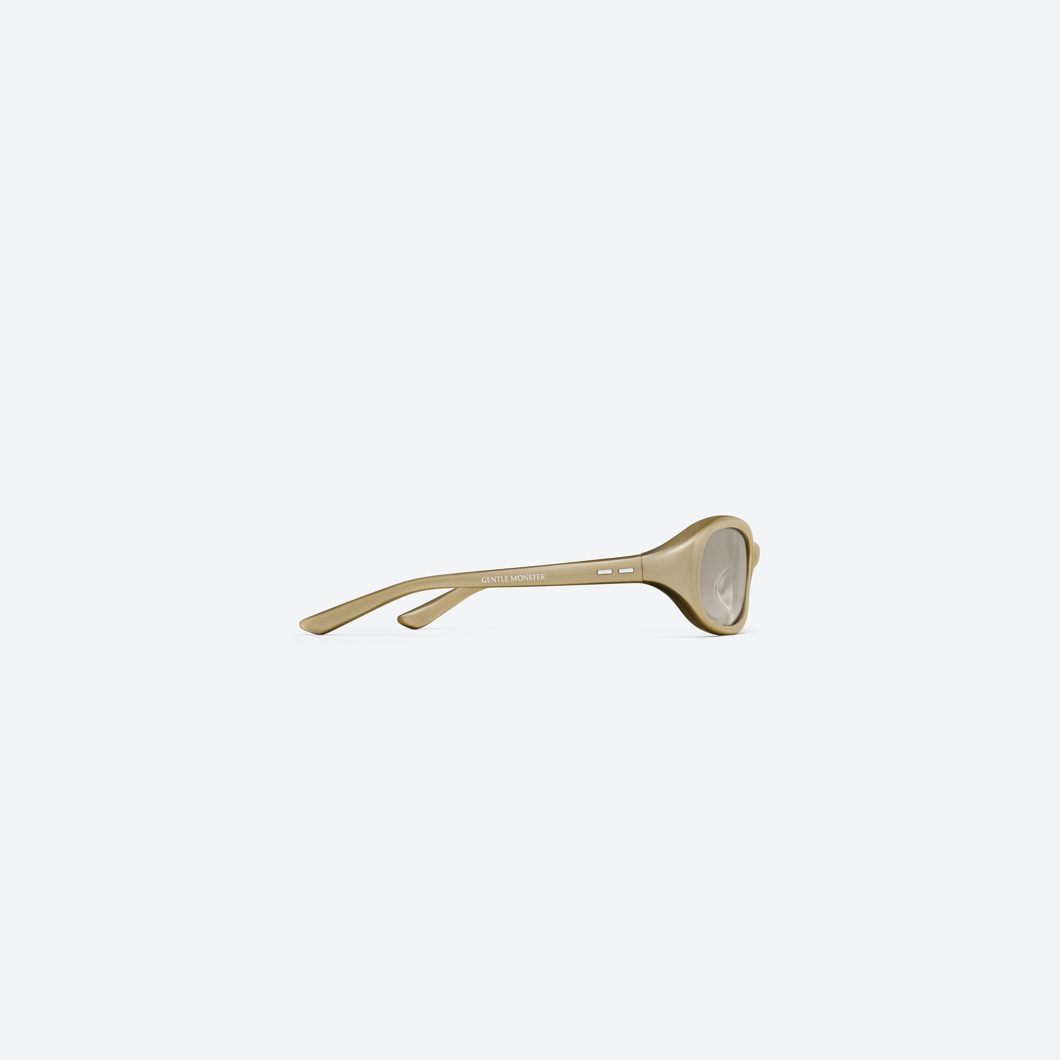 A detailed right view of Gentle Monster Groovy GDC2 Gold Acetate framed Wraparound sunglasses.