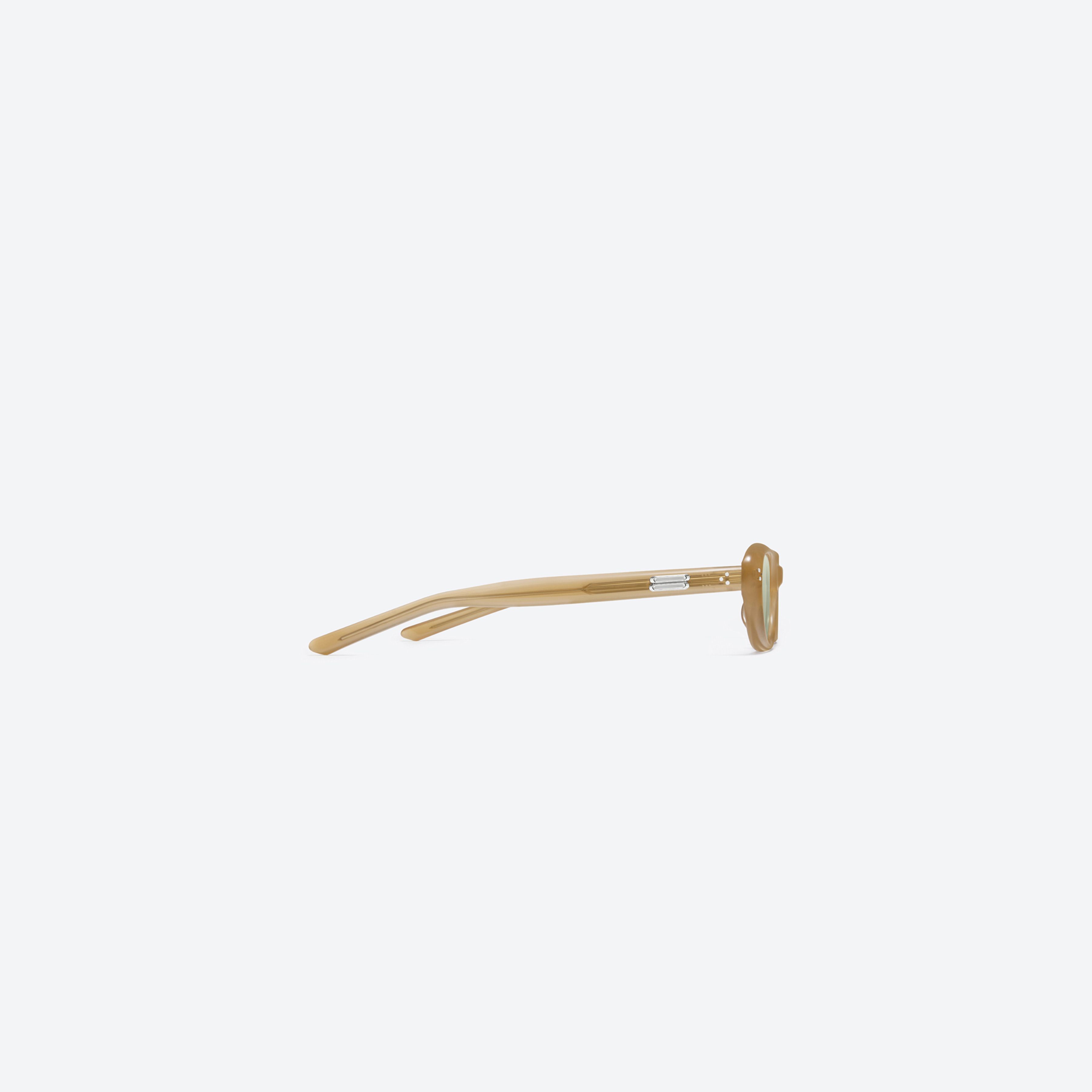 A detailed right view of Gentle Monster Madlenne OC3 Orange Acetate framed Cat-eye sunglasses.