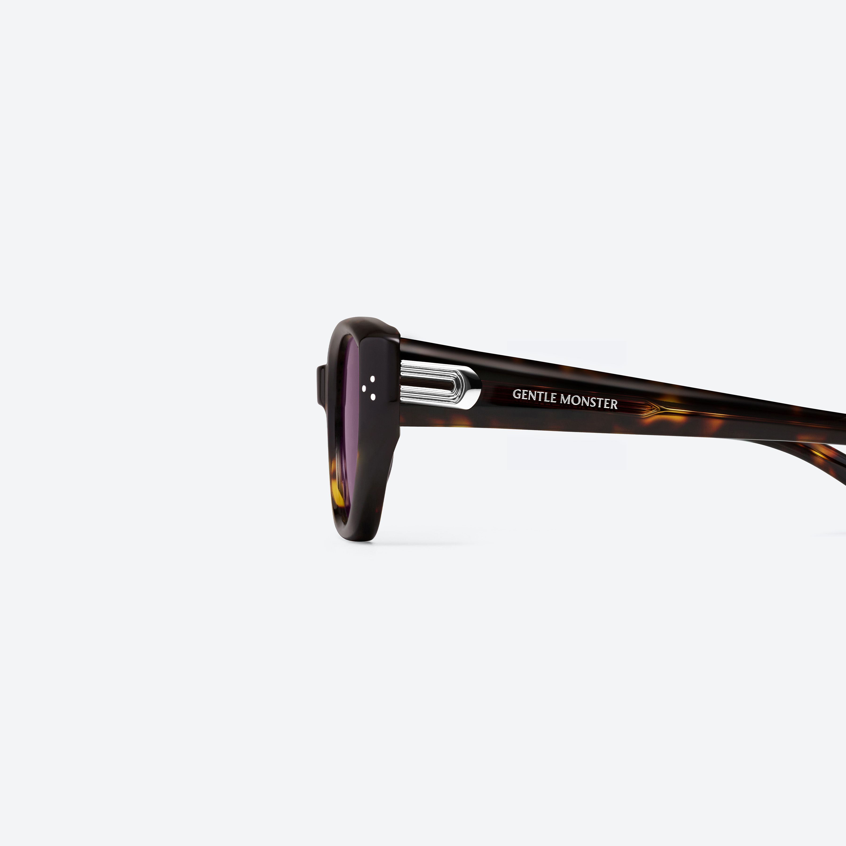 A detailed left view of Gentle Monster Boni T9 Tortoise Acetate framed Cat-eye sunglasses.