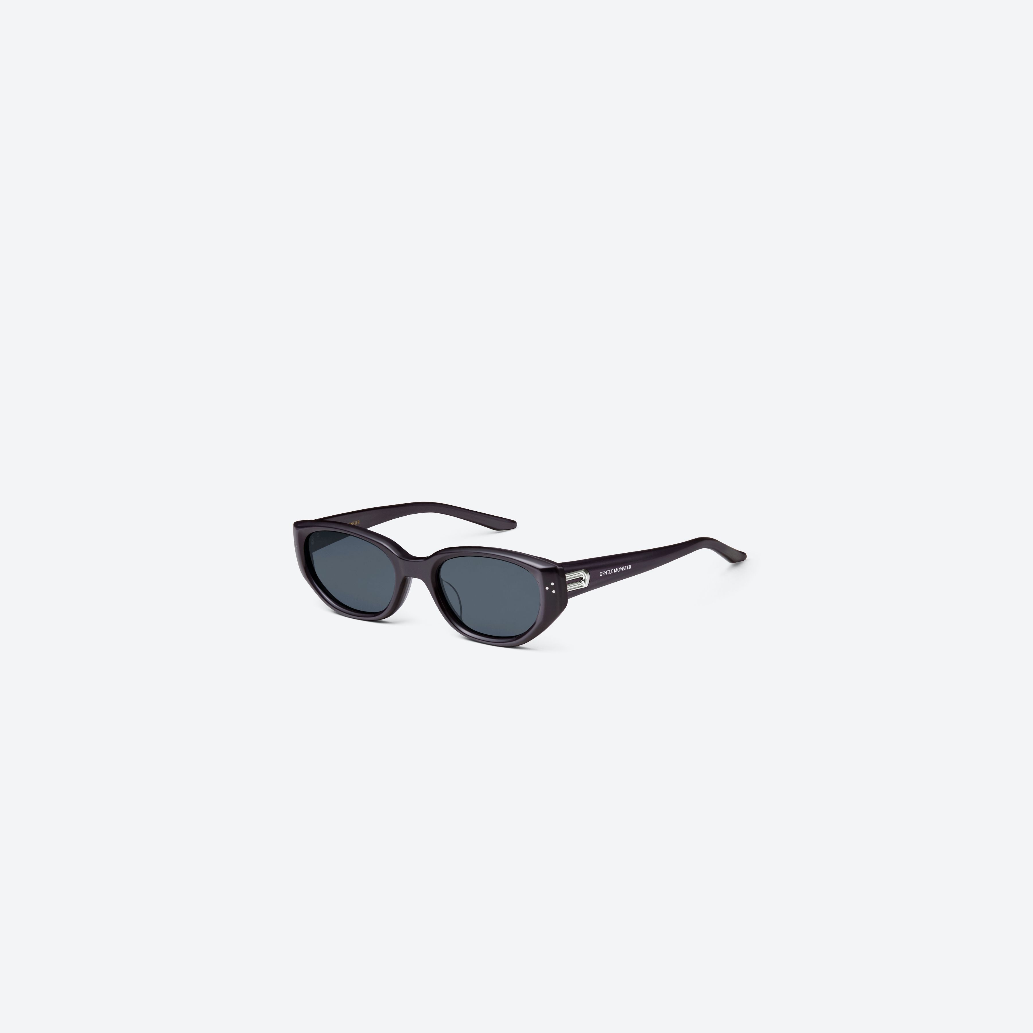 45-degree view of Gentle Monster Boni G11 Gray Acetate framed Cat-eye sunglasses.
