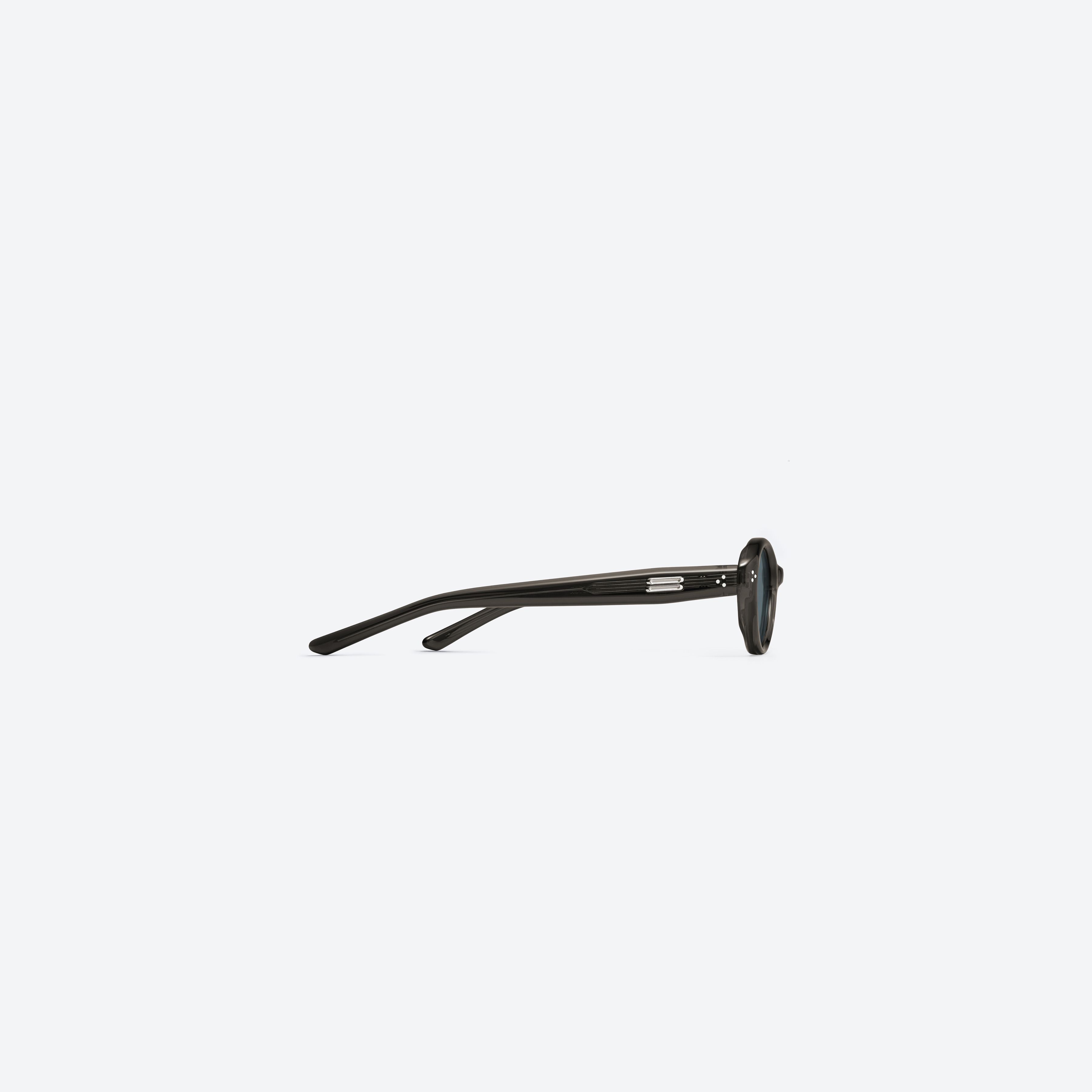 A detailed right view of Gentle Monster Cuscus BRC21 Brown Acetate framed Oval sunglasses.
