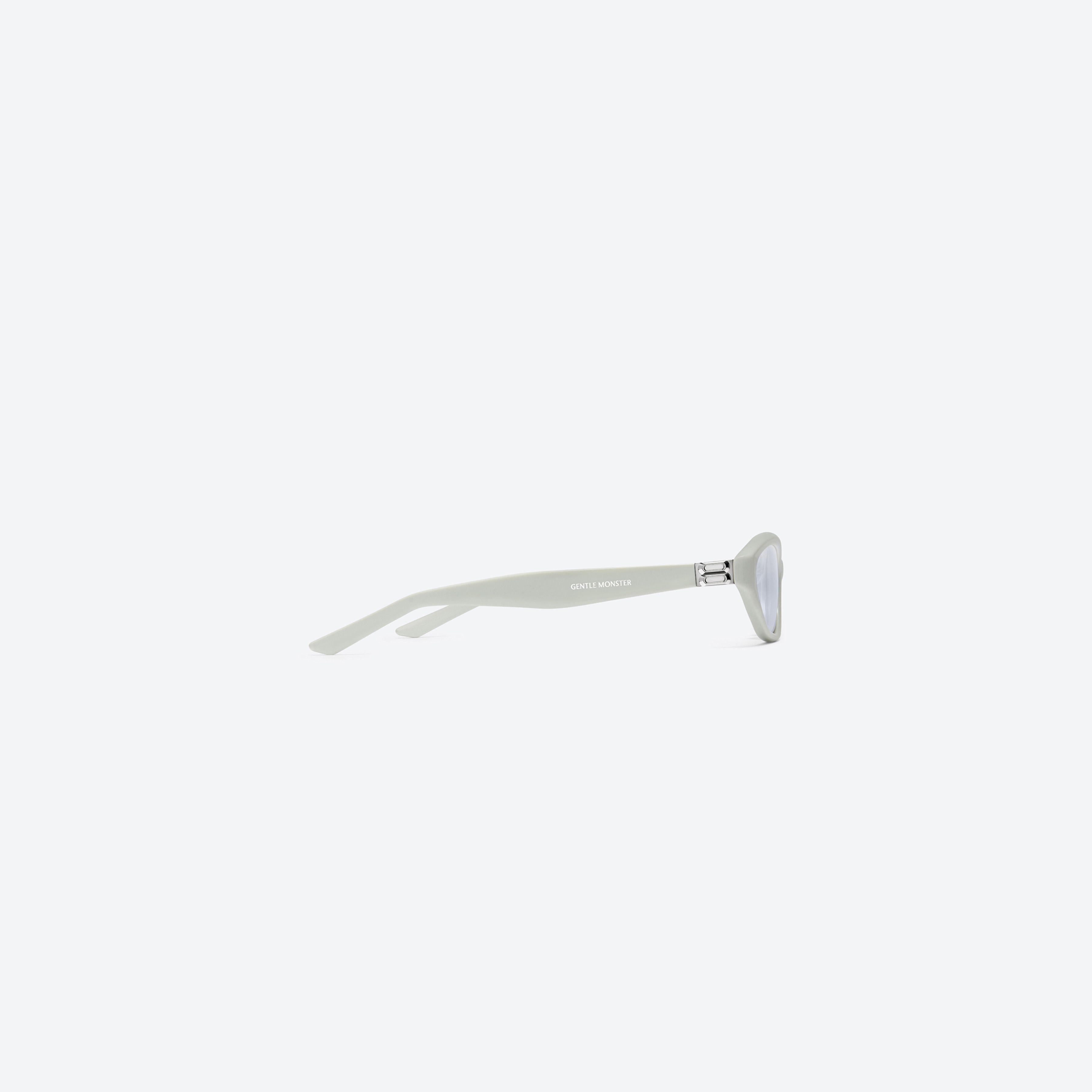 A detailed right view of Gentle Monster Lamda GR11 Green Acetate framed Cat-eye sunglasses.