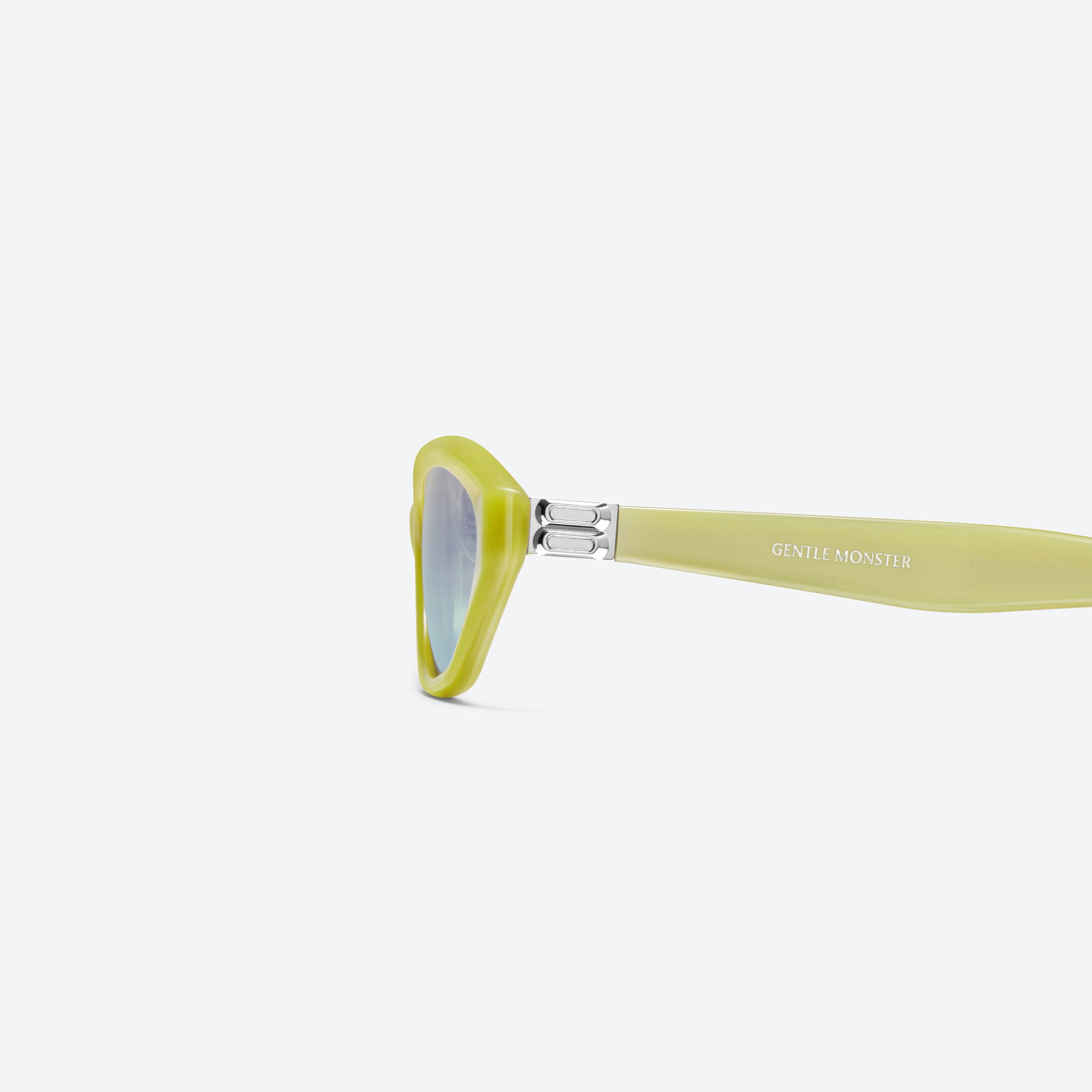 A detailed left view of Gentle Monster LAMDA Y9 Yellow Acetate framed Cat-eye sunglasses.