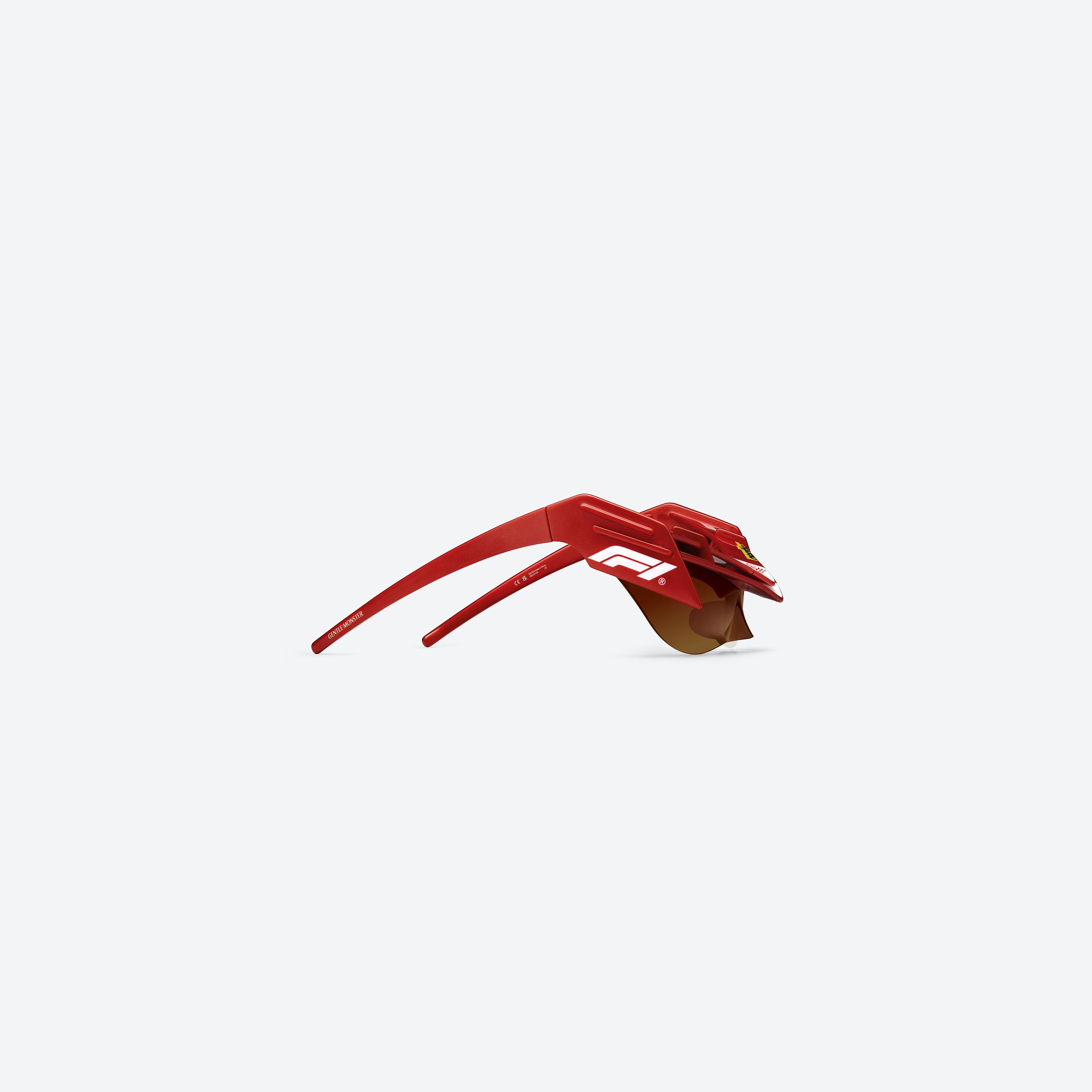 A detailed right view of Gentle Monster WING 4 R13 Red Nylon framed Wraparound sunglasses.