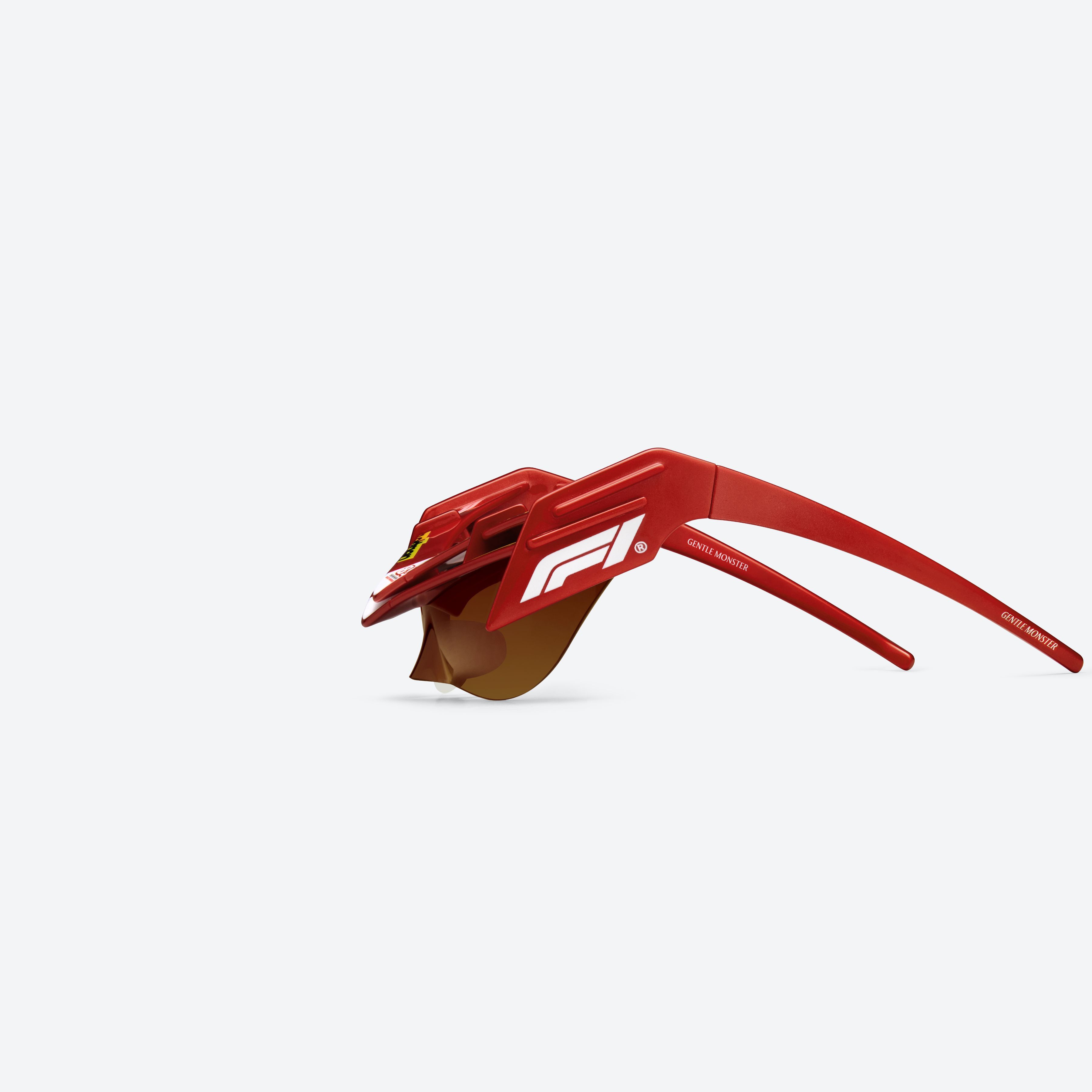 A detailed left view of Gentle Monster WING 4 R13 Red Nylon framed Wraparound sunglasses.