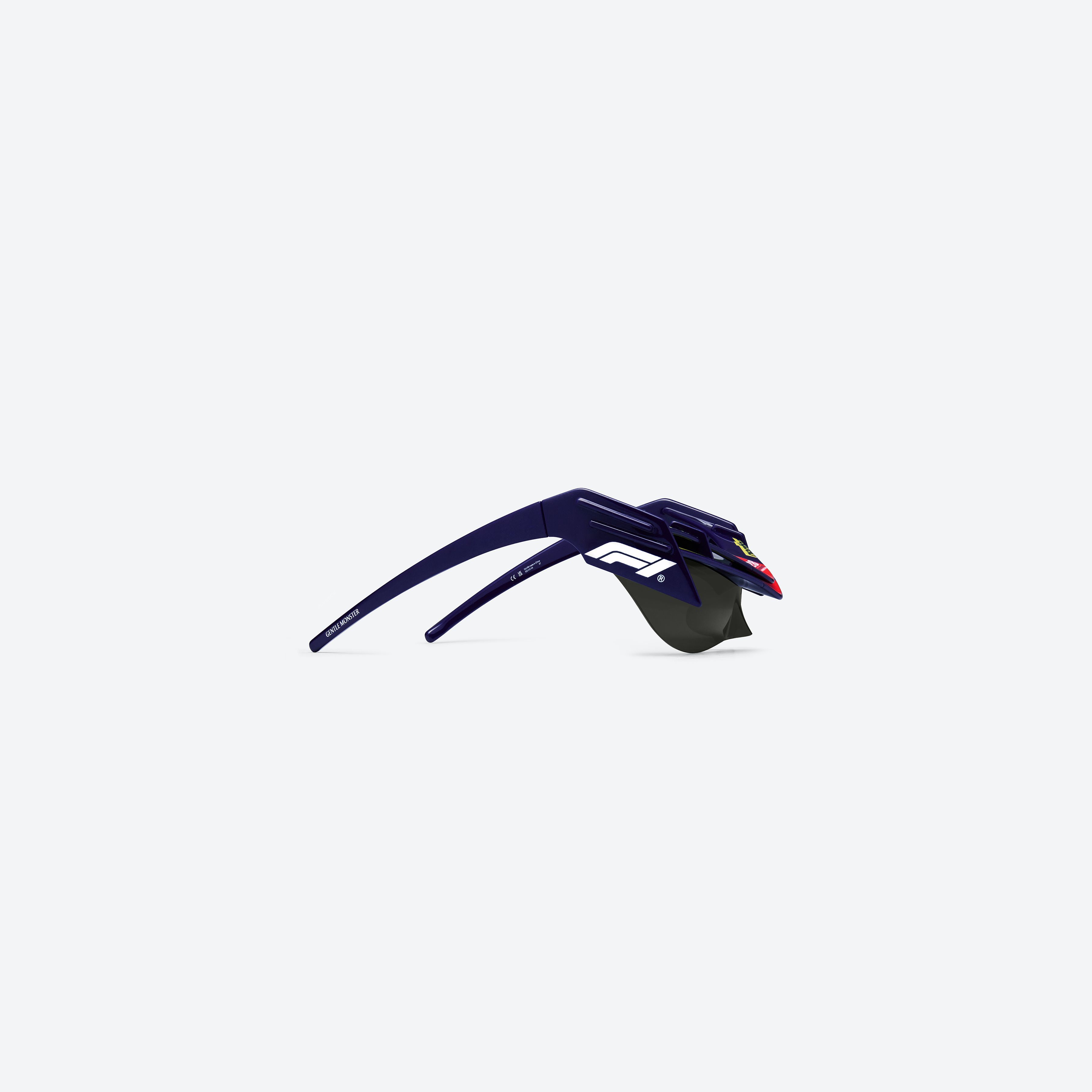A detailed right view of Gentle Monster WING 4 N8 Blue Nylon framed Wraparound sunglasses.