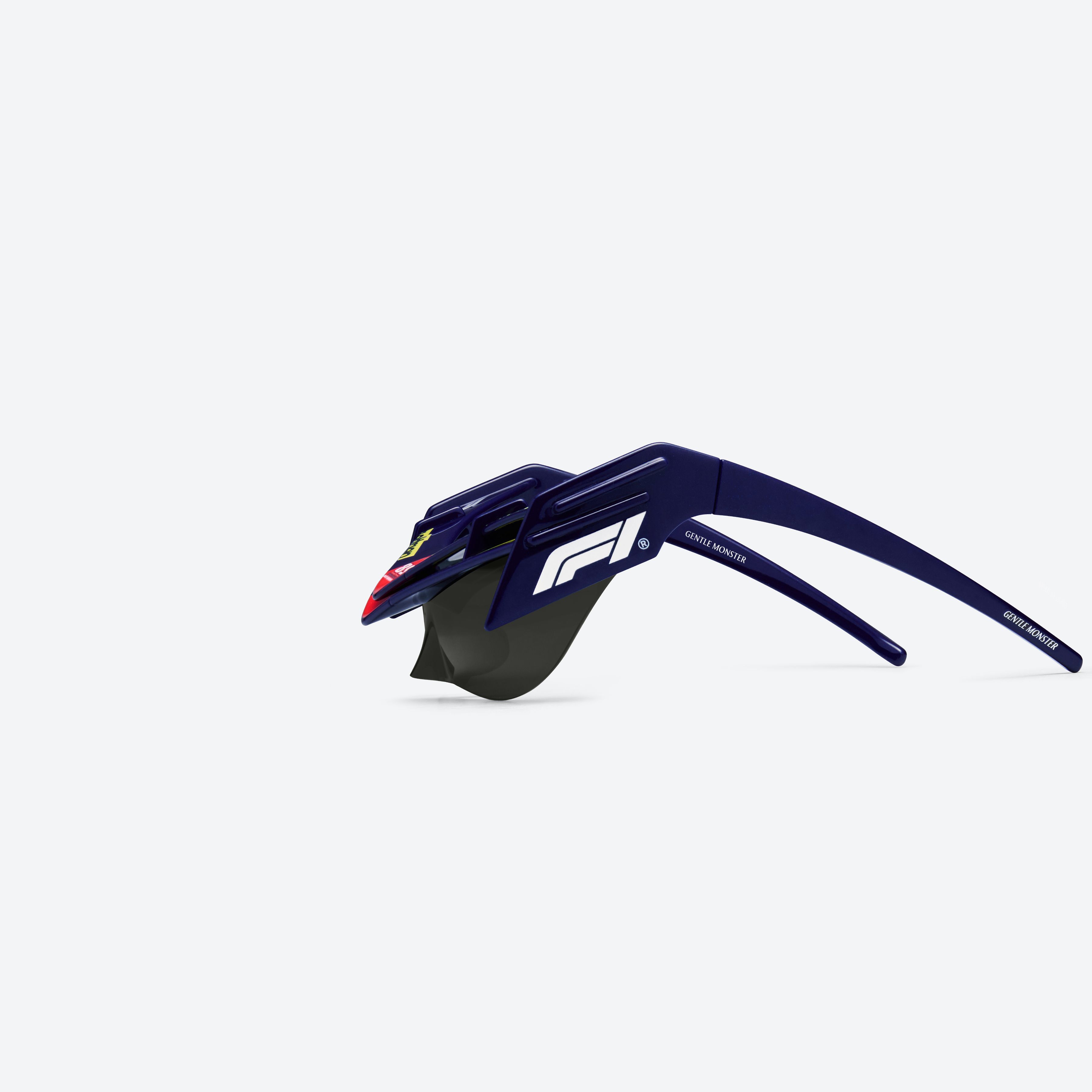 A detailed left view of Gentle Monster WING 4 N8 Blue Nylon framed Wraparound sunglasses.