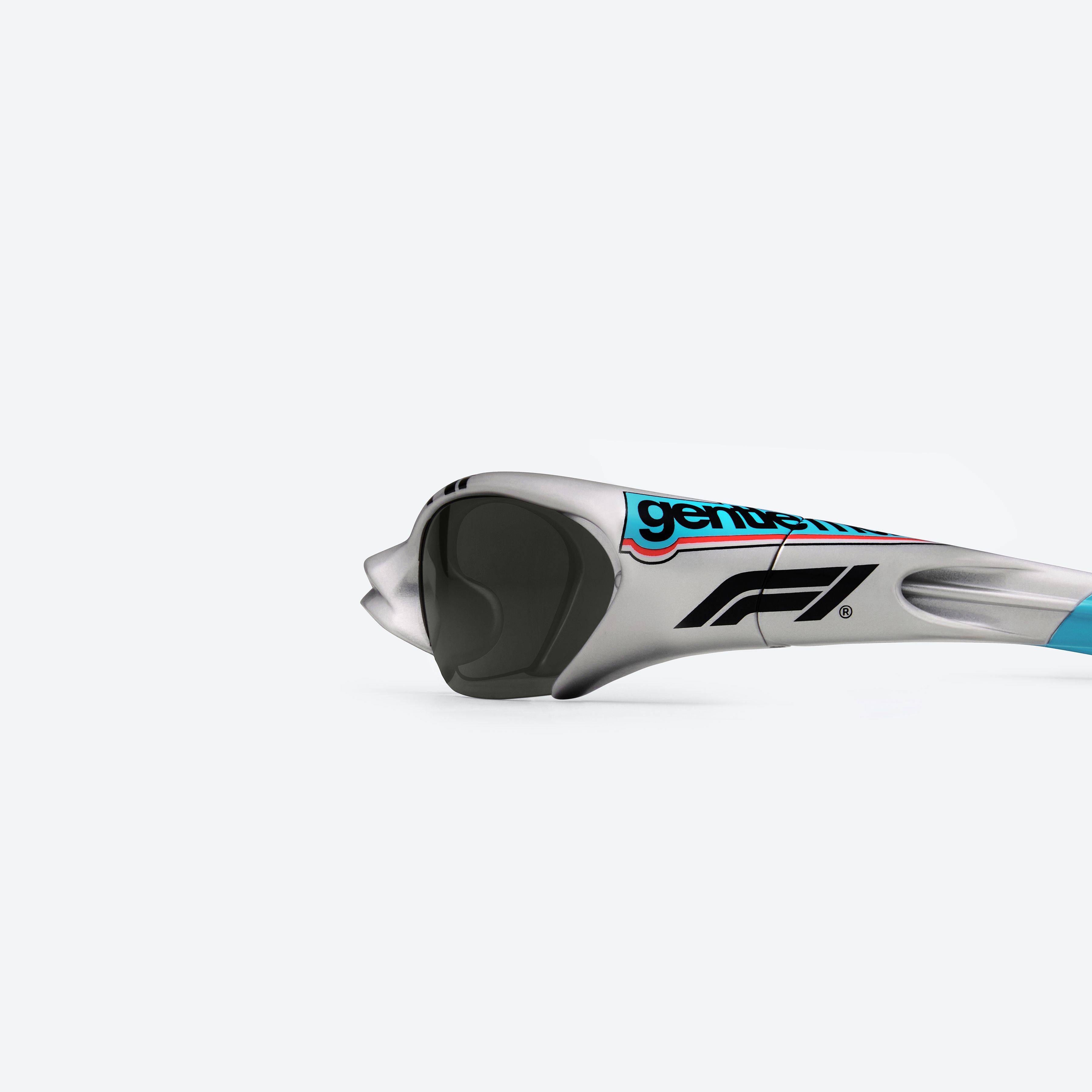 A detailed left view of Gentle Monster SLIPSTREAM G21 Gray Nylon framed Wraparound sunglasses.