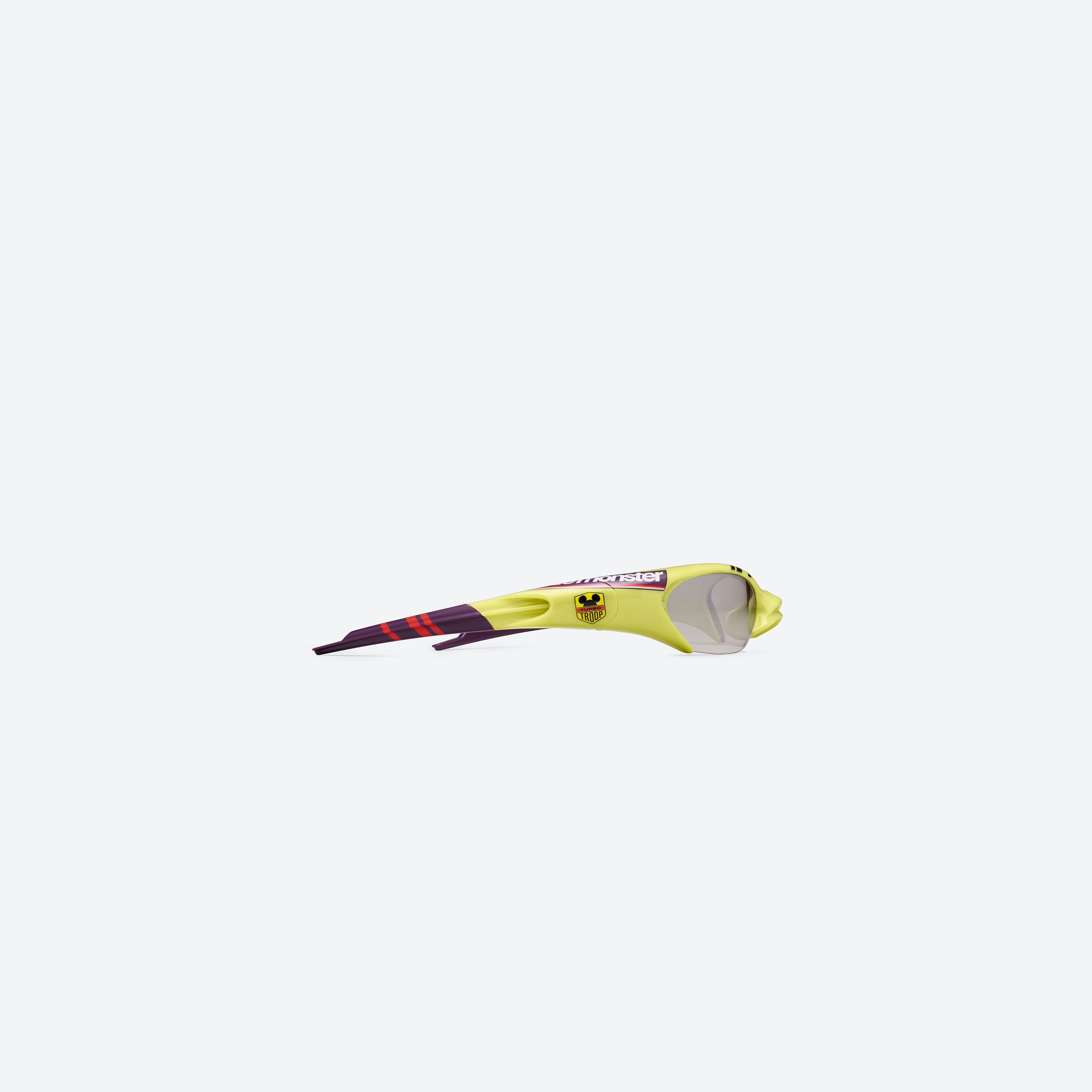 A detailed right view of Gentle Monster SLIPSTREAM GR13 Green Nylon framed Wraparound sunglasses.