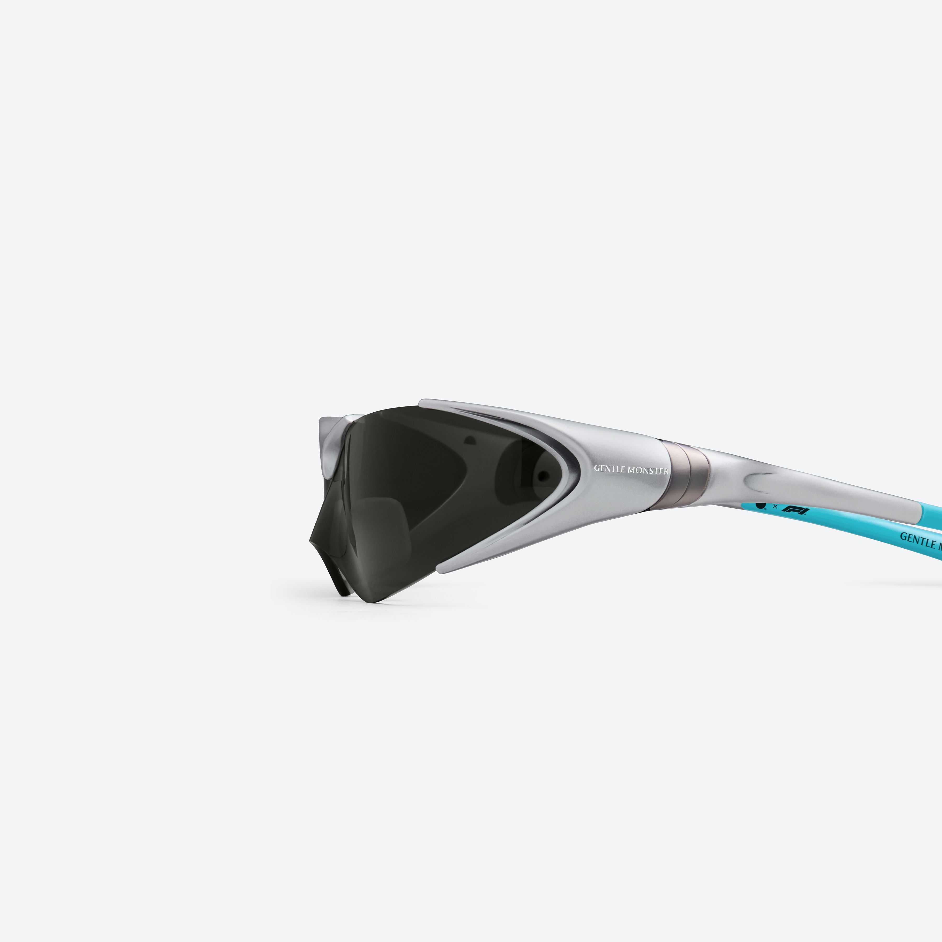 A detailed left view of Gentle Monster Disney F1 - Aero G21 Gray Nylon framed Wraparound sunglasses.