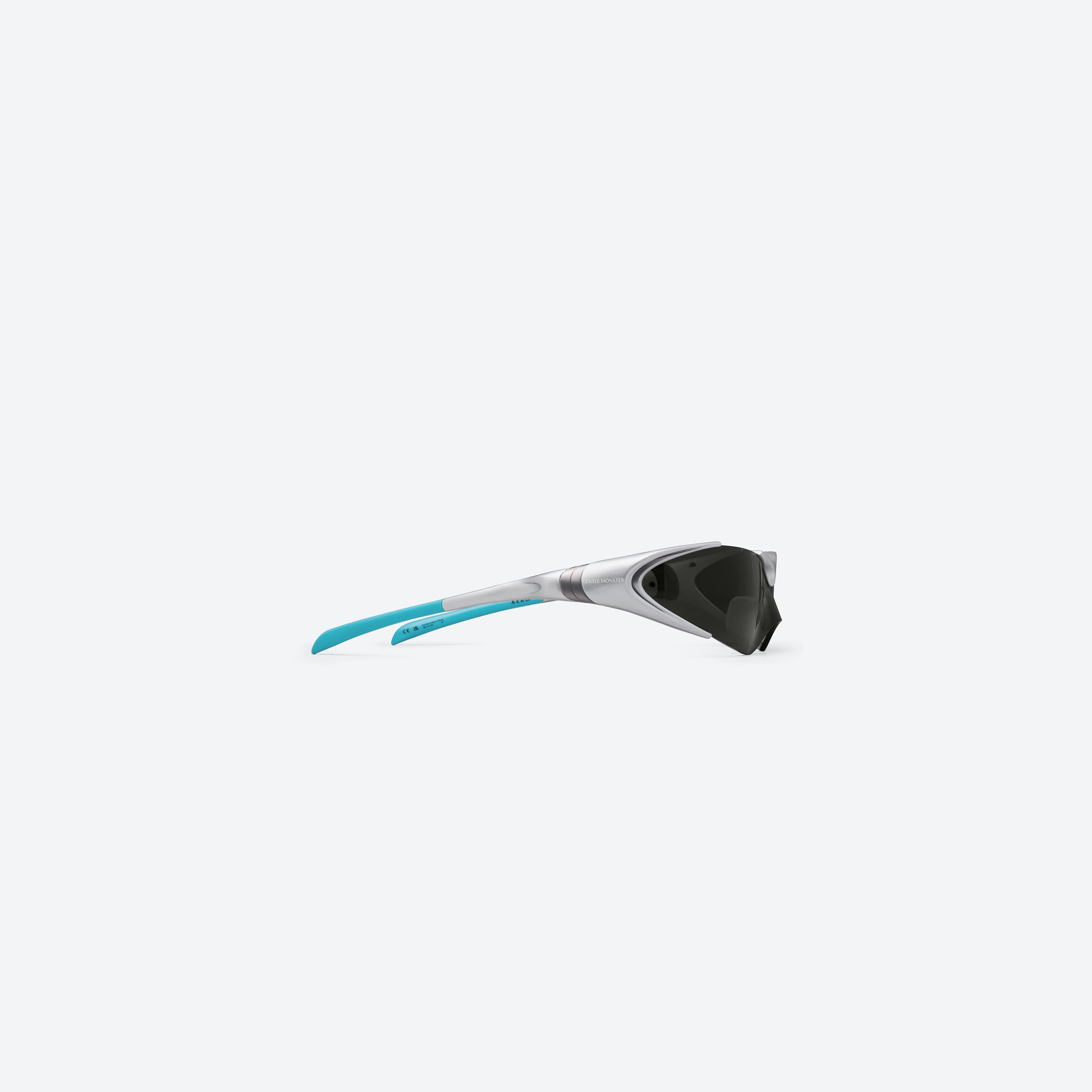 A detailed right view of Gentle Monster Disney F1 - Aero G21 Gray Nylon framed Wraparound sunglasses.