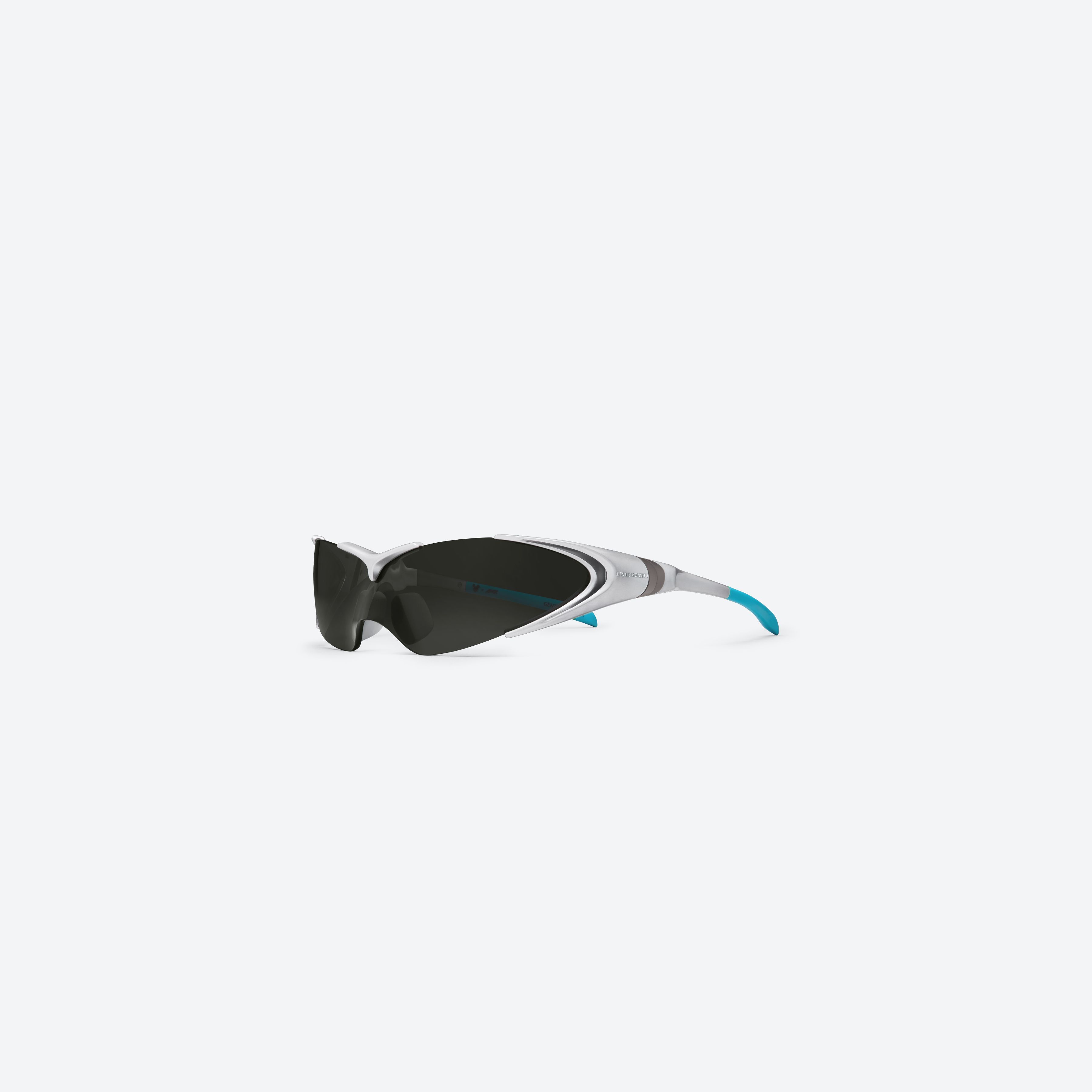 45-degree view of Gentle Monster Disney F1 - Aero G21 Gray Nylon framed Wraparound sunglasses.
